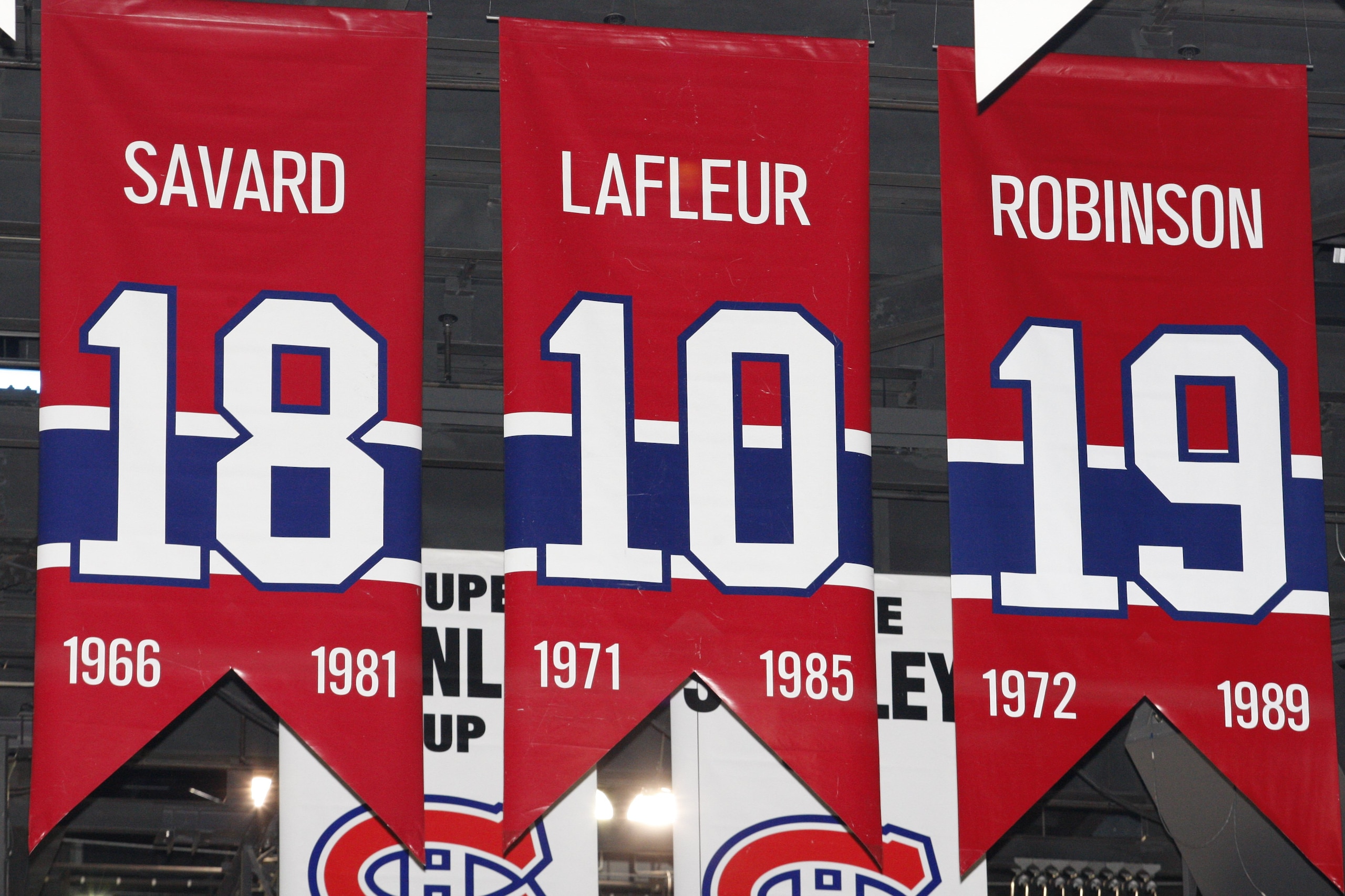 MONTREAL- APRIL 19:  A photo of the banners commemorating the retired jerseys of Serge Savard, Guy Lafleur and Larry Robinson hanging in the Bell Centre prior to Game Three of the Eastern Conference Quarterfinals between the Washington Capitals and Montre