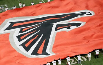 ATLANTA, GA - JANUARY 15:  A giant flag with the Atlanta Falcons logo is seen on the field against the Green Bay Packers during their 2011 NFC divisional playoff game at Georgia Dome on January 15, 2011 in Atlanta, Georgia.  (Photo by Kevin C. Cox/Getty I