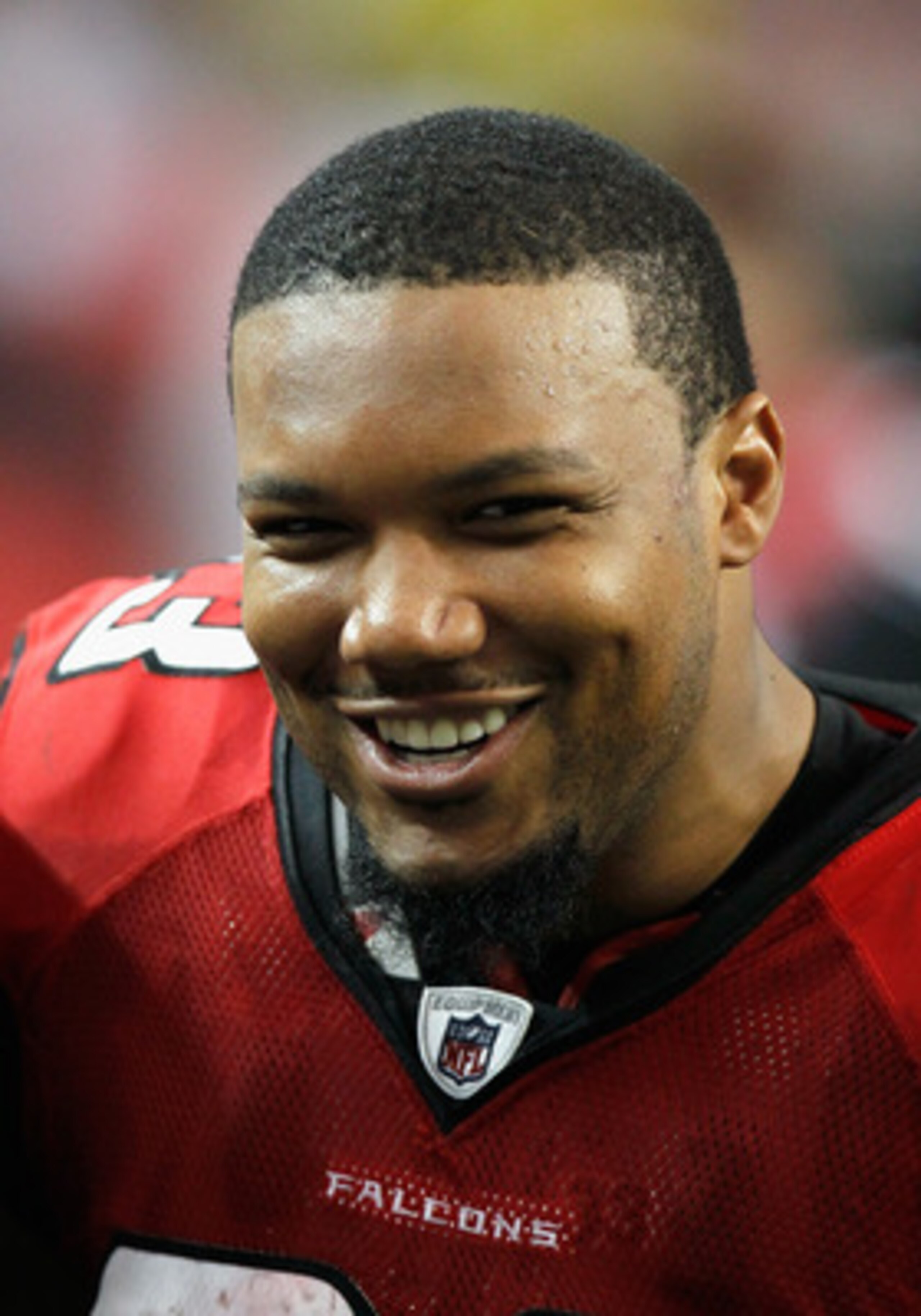 ATLANTA, GA - JANUARY 02:  Michael Turner #33 of the Atlanta Falcons enjoys a laugh in the final minutes of their 33-10 win over the Carolina Panthers at Georgia Dome on January 2, 2011 in Atlanta, Georgia.  (Photo by Kevin C. Cox/Getty Images)