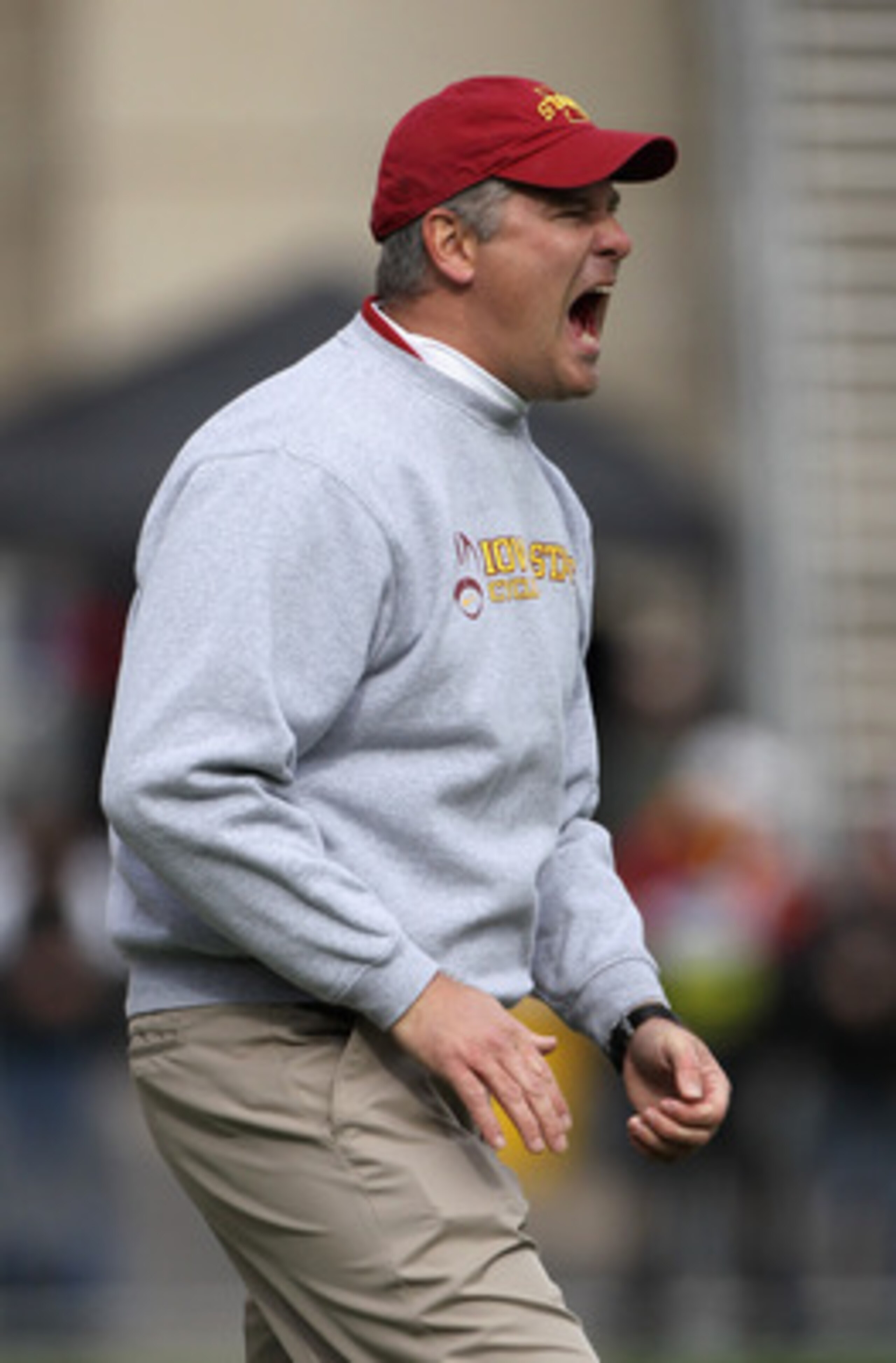 BOULDER, CO - NOVEMBER 13:  Head coach Paul Rhoads of the Iowa State Cyclones leads his team against the Colorado Buffaloes at Folsom Field on November 13, 2010 in Boulder, Colorado. Colorado defeated Iowa State 34-14.  (Photo by Doug Pensinger/Getty Imag