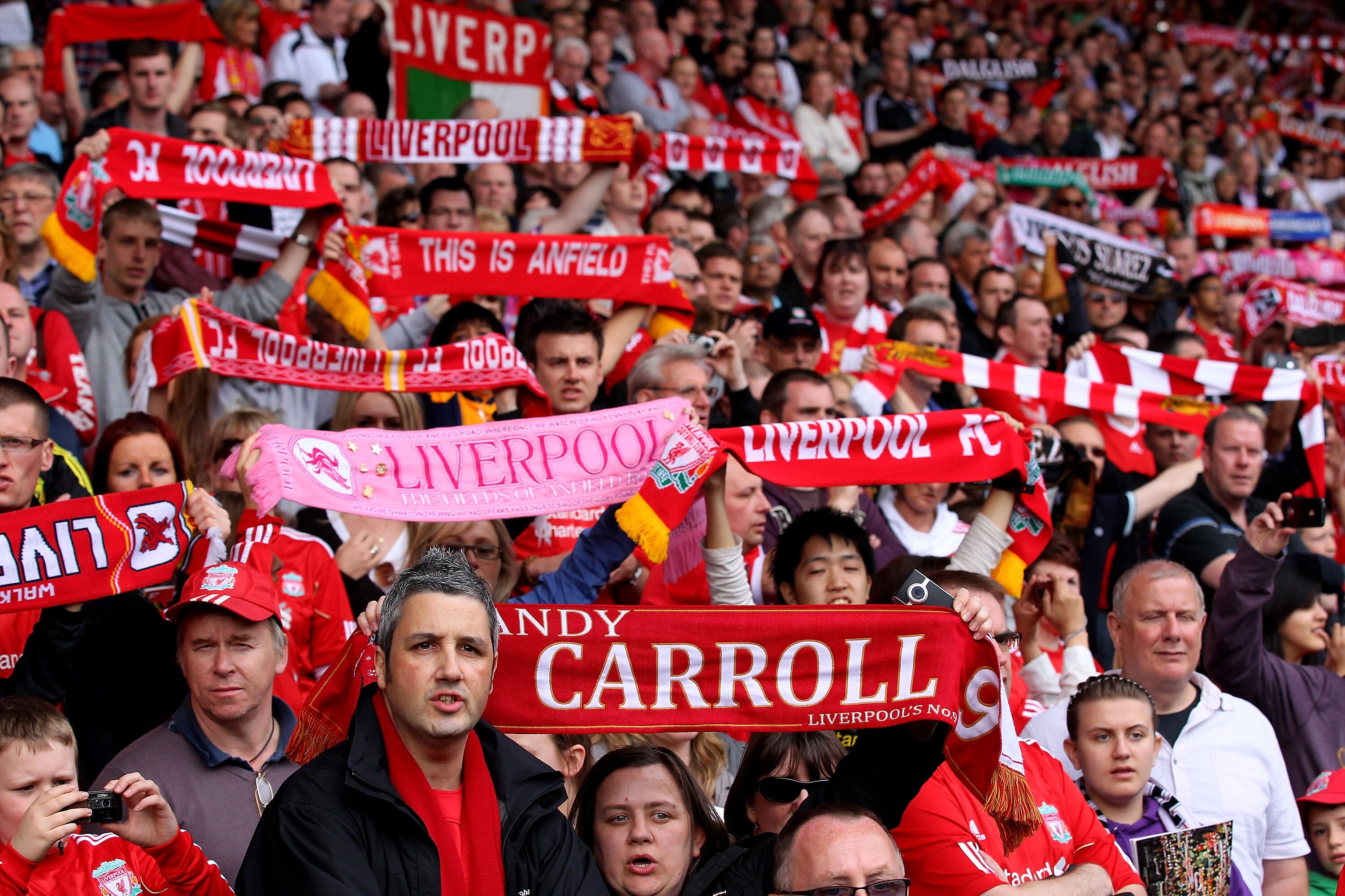 LIVERPOOL, ENGLAND - APRIL 23:  Liverpool fans show their support prior to the Barclays Premier League match between Liverpool and Birmingham City at Anfield on April 23, 2011 in Liverpool, England.  (Photo by Clive Brunskill/Getty Images)