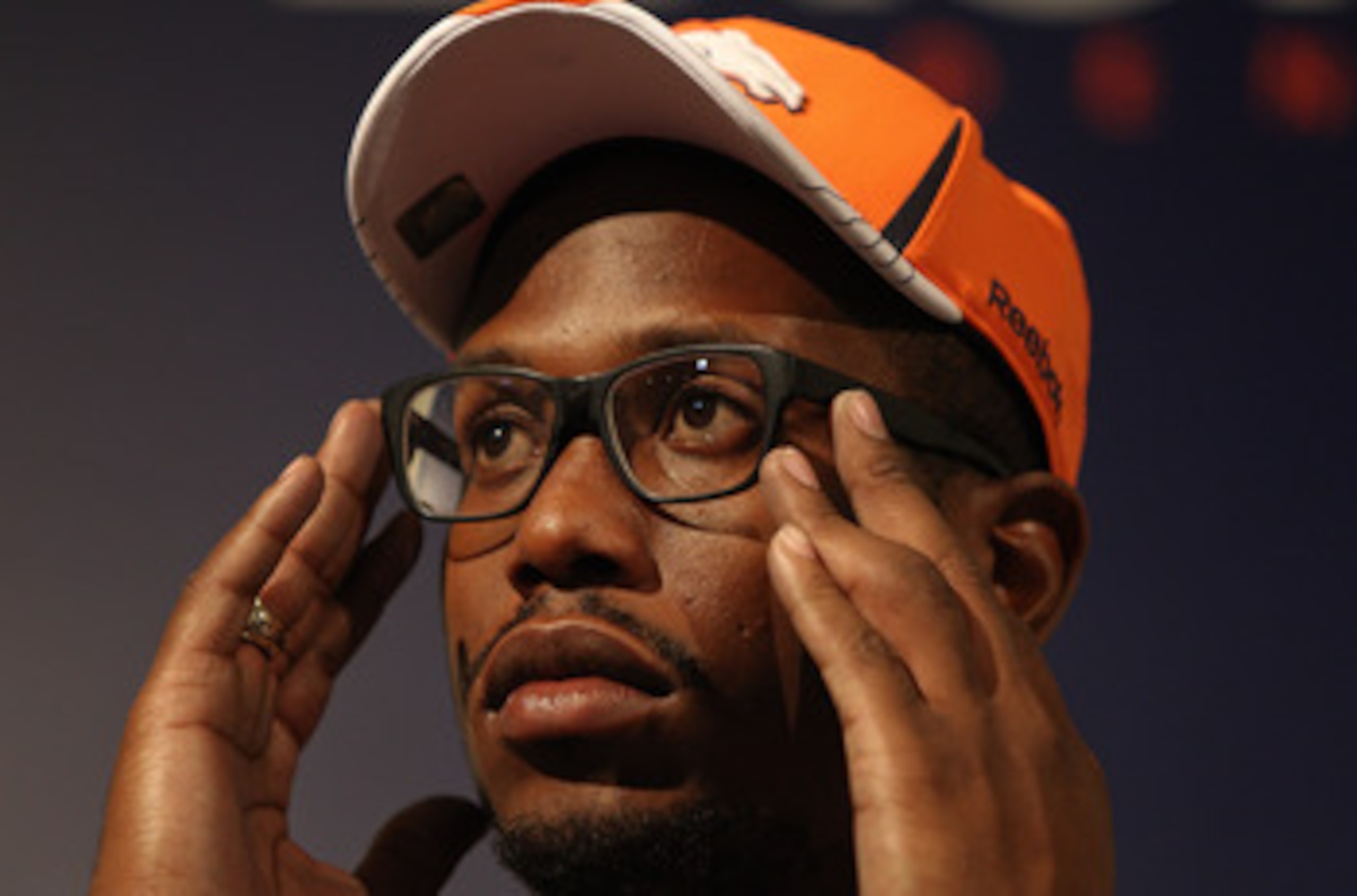 ENGLEWOOD, CO - APRIL 29:  Von Miller of the Denver Broncos adjusts his glasses while speaking to the media at Dove Valley on April 29, 2011 in Englewood, Colorado. Miller, a projected outside linebacker in head coach John Fox's new 4-3 scheme, was select
