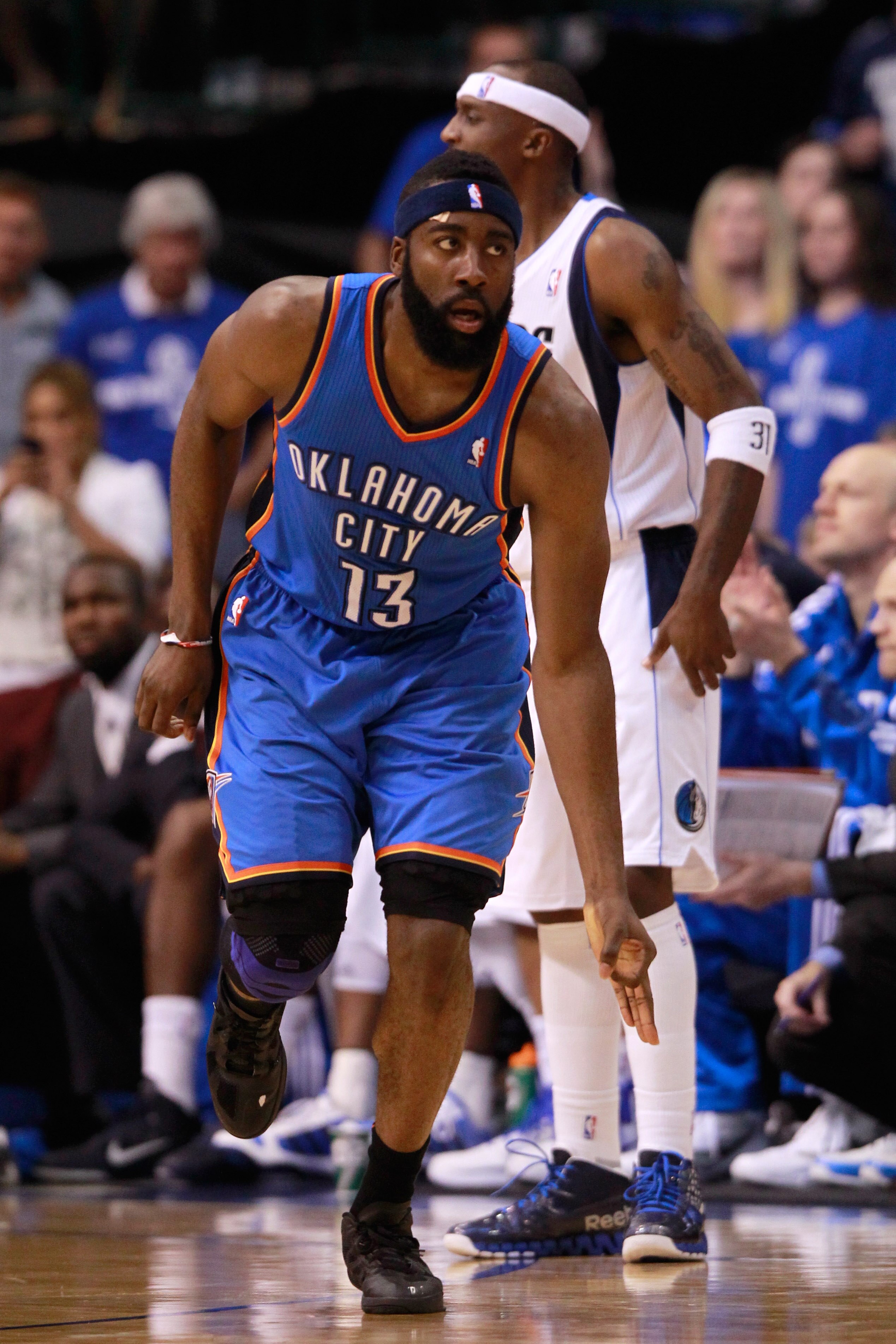 DALLAS, TX - MAY 19:  James Harden #13 of the Oklahoma City Thunder reacts after making a three-pointer in the second half while taking on the Dallas Mavericks in Game Two of the Western Conference Finals during the 2011 NBA Playoffs at American Airlines