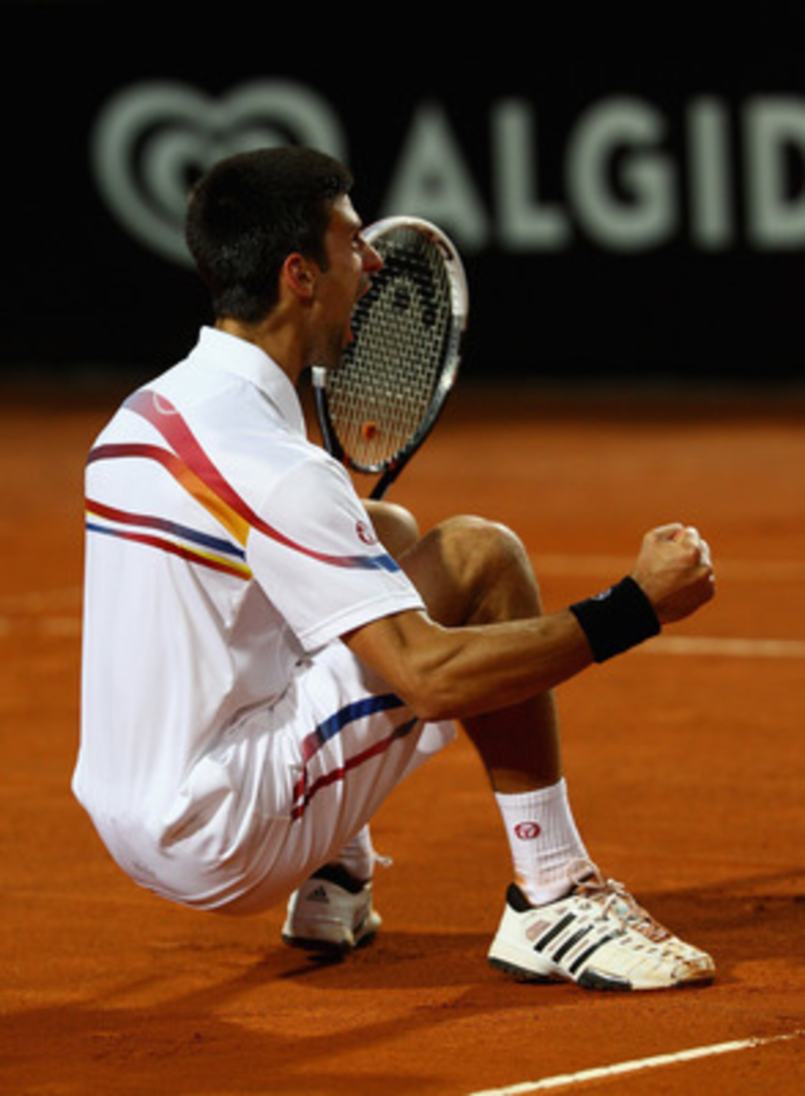 ROME, ITALY - MAY 15:  Novak Djokovic of Serbia celebrates match point during the final against Rafael Nadal of Spain during day eight of the Internazoinali BNL D'Italia at the Foro Italico Tennis Centre on May 15, 2011 in Rome, Italy.  (Photo by Clive Br