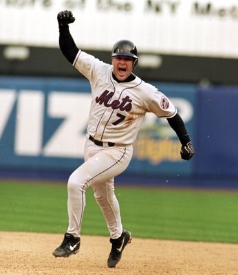 9 Oct 1999: Todd Pratt #7 of the New York Mets celebrates during the game against the Arizona DiamondBacks at Shea Stadium in Flushing, New York. The Mets defeated the DiamondBacks 4-3.