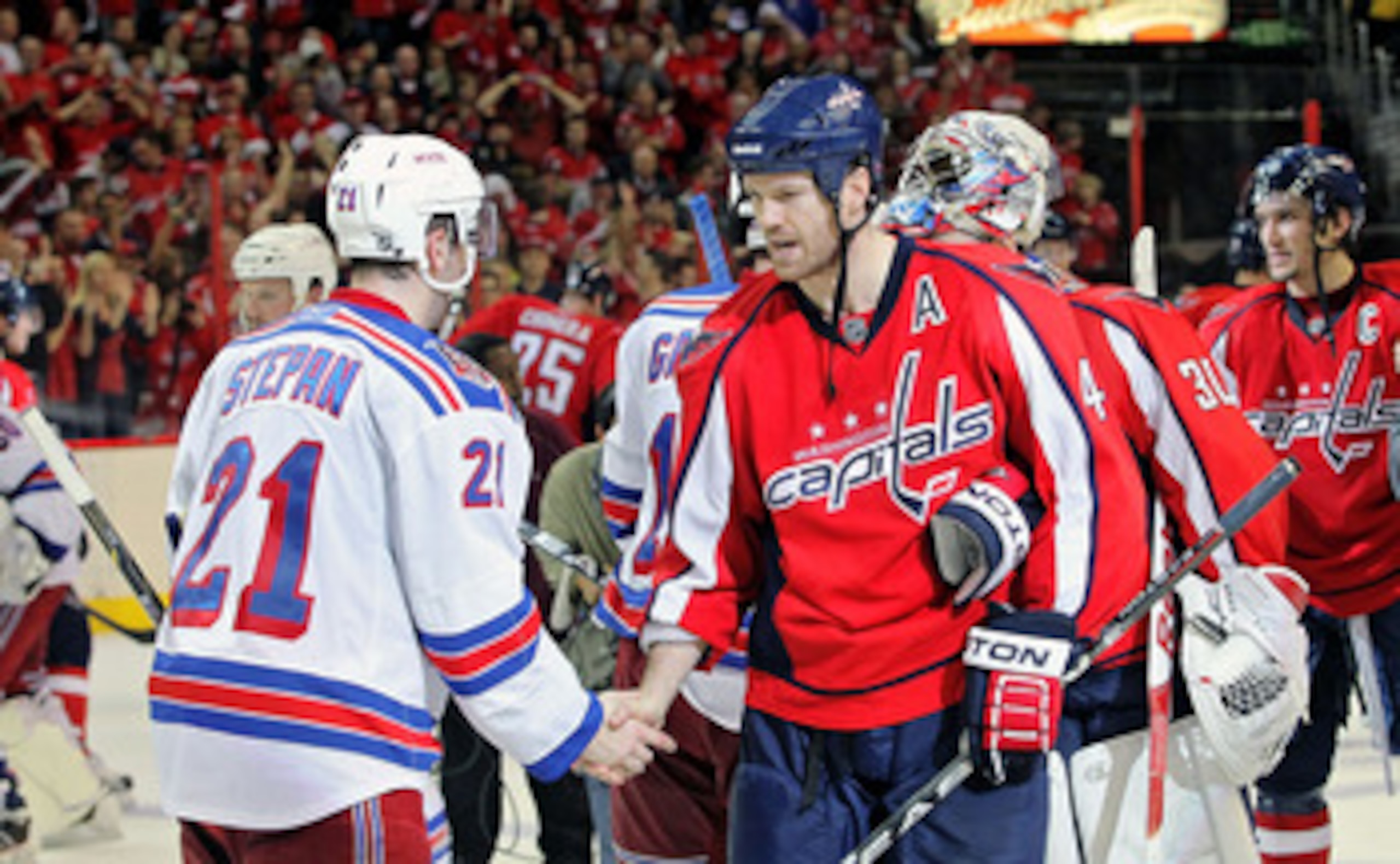 WASHINGTON , DC - APRIL 23:  Jason Arnott #44 of the Washington Capitals greets Derek Stepan #21 of the New York Rangers during the handshake following a 3-1 win over the Rangers in Game Five of the Eastern Conference Quarterfinals during the 2011 NHL Sta