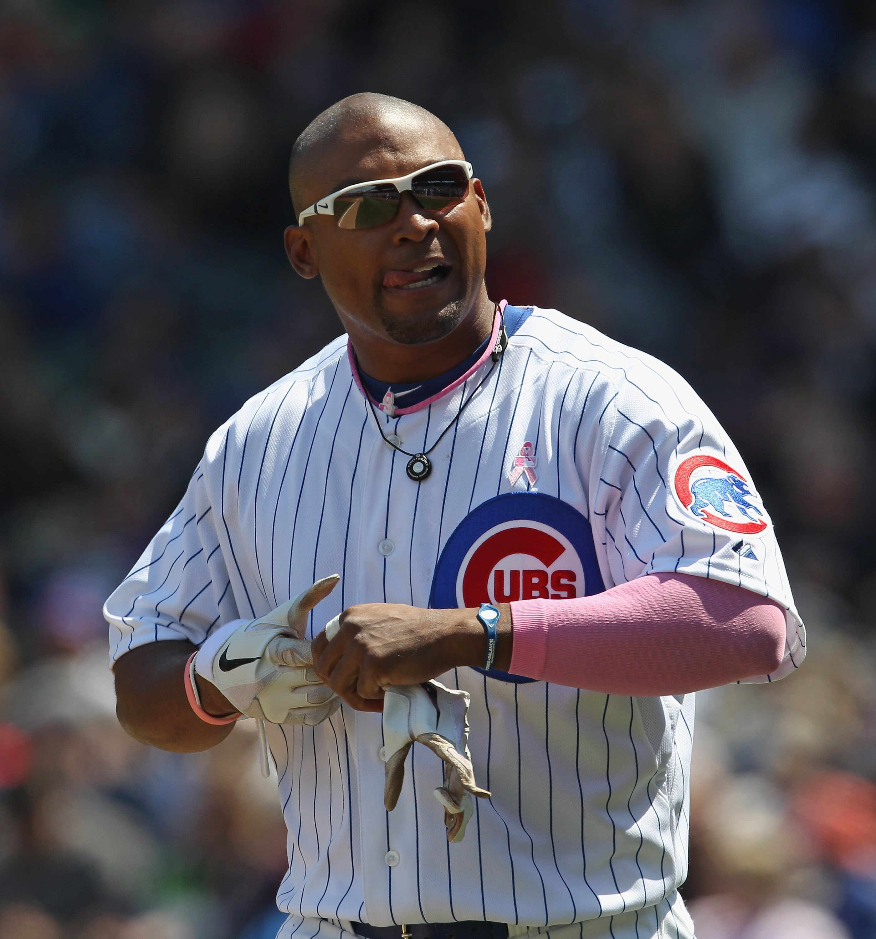 CHICAGO, IL - MAY 08: Marlon Byrd #24 of the Chicago Cubs walks to the outfield against the Cincinnati Reds at Wrigley Field on May 8, 2011 in Chicago, Illinois. The Reds defeated the Cubs 2-0.  (Photo by Jonathan Daniel/Getty Images)