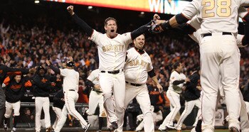 SAN FRANCISCO, CA - APRIL 09:  Aubrey Huff #17 celebrates after Miguel Tejada of the San Francisco Giants hit the game winning hit in the ninth inning against the St. Louis Cardinals at AT&T Park on April 9, 2011 in San Francisco, California.  (Photo by J