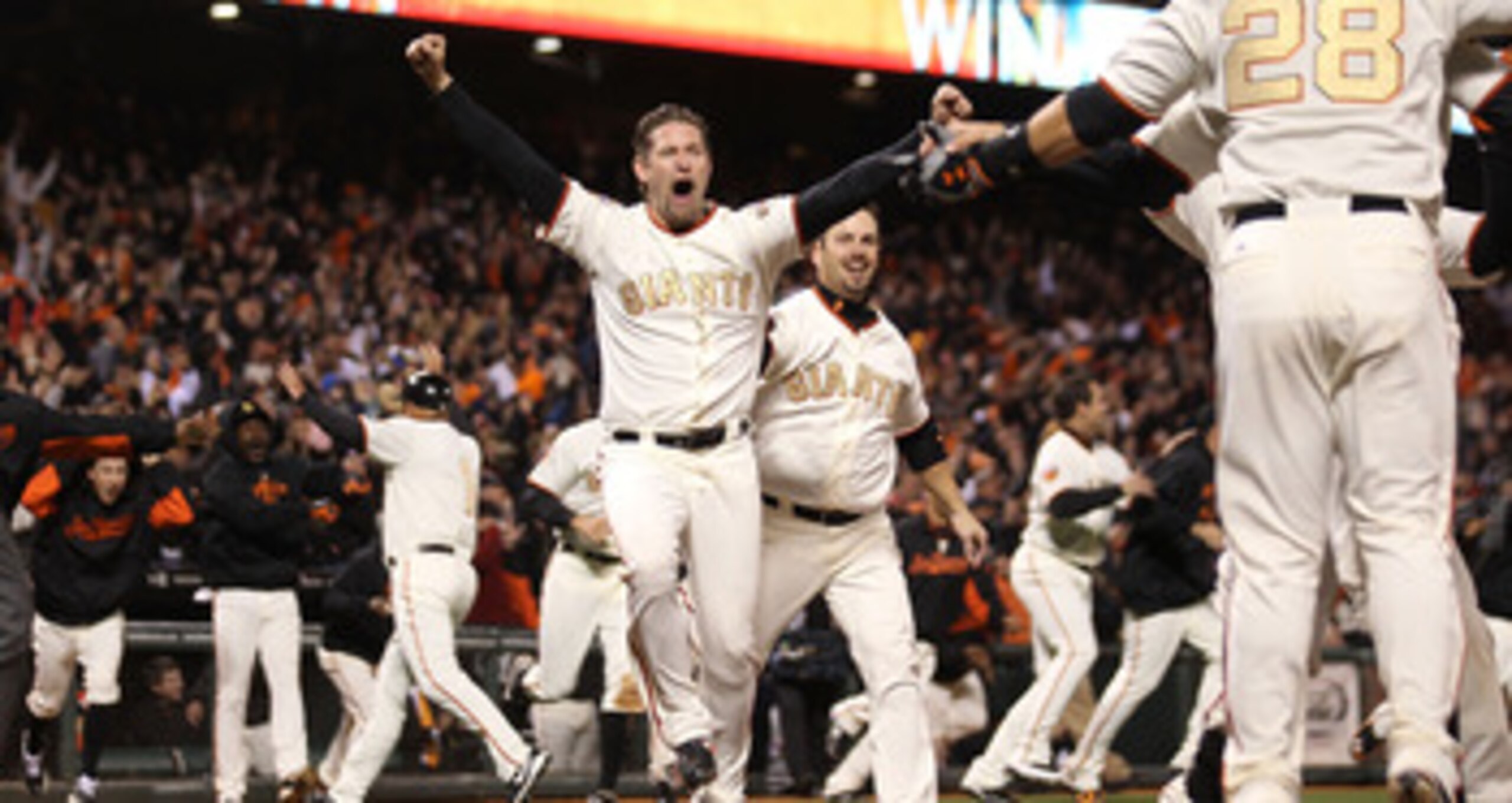 SAN FRANCISCO, CA - APRIL 09: Aubrey Huff #17 celebrates after Miguel Tejada of the San Francisco Giants hit the game winning hit in the ninth inning against the St. Louis Cardinals at AT&T Park on April 9, 2011 in San Francisco, California. (Photo by J SAN FRANCISCO, CA - APRIL 09: Aubrey Huff #17 celebrates after Miguel Tejada of the San Francisco Giants hit the game winning hit in the ninth inning against the St. Louis Cardinals at AT&T Park on April 9, 2011 in San Francisco, California. (Photo by J