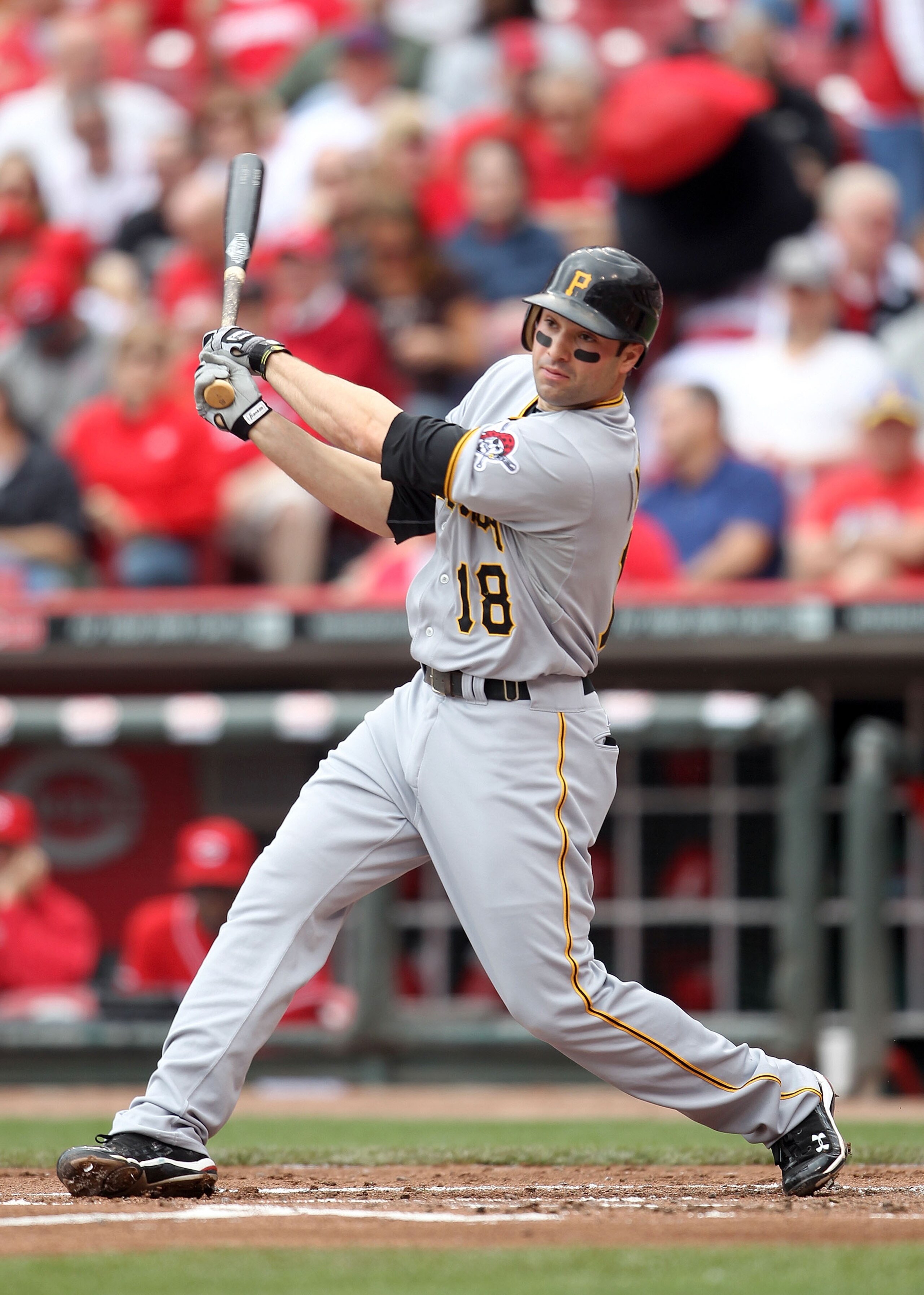CINCINNATI, OH - MAY 19: Neil Walker #18 of the Pittsburgh Pirates hits a double during the game against the Cincinnati Reds at Great American Ball Park on May 19, 2011 in Cincinnati, Ohio.  The Pirates won 5-3. (Photo by Andy Lyons/Getty Images)