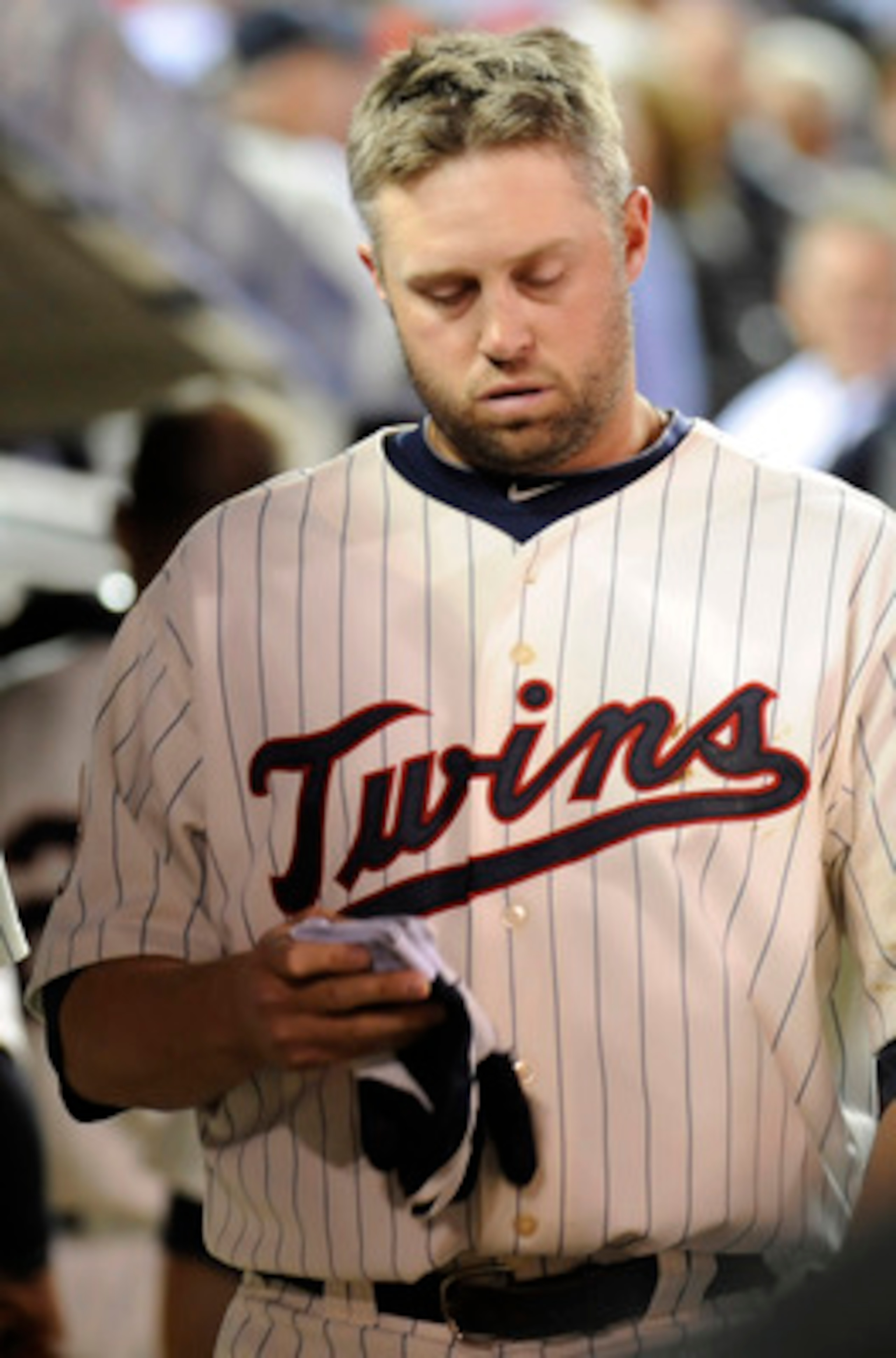 MINNEAPOLIS, MN - OCTOBER 7: Michael Cuddyer #5 of the Minnesota Twins in the dugout following a 2-5 loss to the New York Yankees in game two of the ALDS game on October 7, 2010 at Target Field in Minneapolis, Minnesota. (Photo by Hannah Foslien /Getty Im MINNEAPOLIS, MN - OCTOBER 7: Michael Cuddyer #5 of the Minnesota Twins in the dugout following a 2-5 loss to the New York Yankees in game two of the ALDS game on October 7, 2010 at Target Field in Minneapolis, Minnesota. (Photo by Hannah Foslien /Getty Im