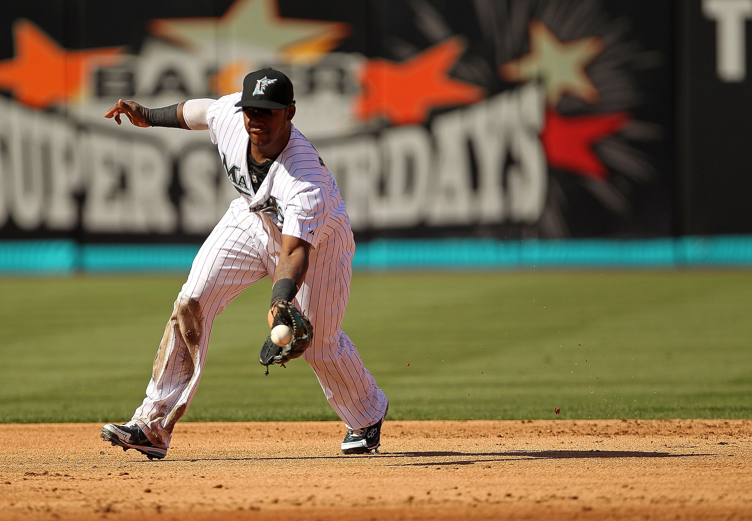 MIAMI GARDENS, FL - MAY 21: Hanley Ramirez #2 of the Florida Marlins fields a ground ball during a game against the Tampa Bay Rays at Sun Life Stadium on May 21, 2011 in Miami Gardens, Florida. (Photo by Mike Ehrmann/Getty Images)