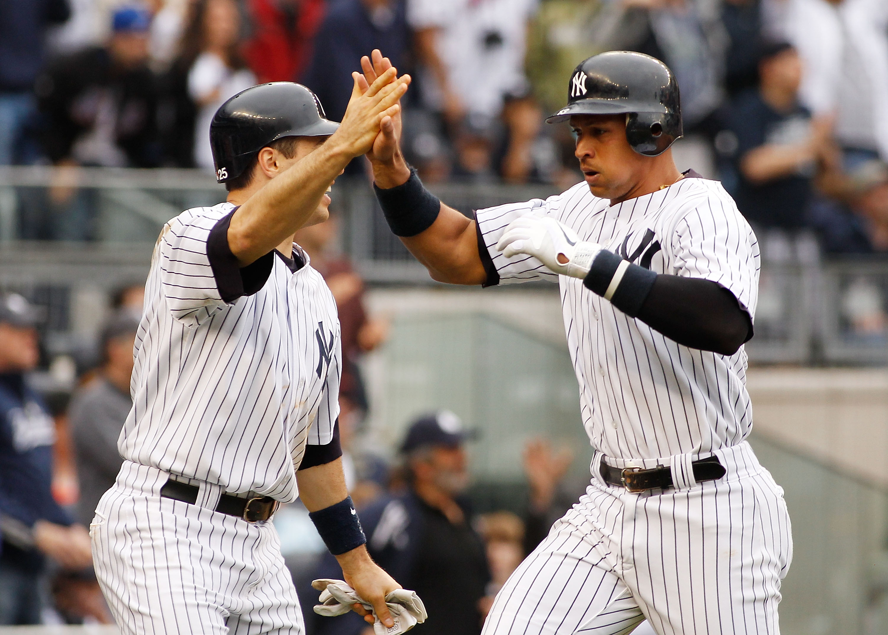 NEW YORK - MAY 22:  Alex Rodriguez #13 of the New York Yankees scores in the seventh inning against the New York Mets on May 22, 2011 at Yankee Stadium in the Bronx borough of New York City. Yankees defeat the Mets 9-3.
 (Photo by Mike Stobe/Getty Images)
