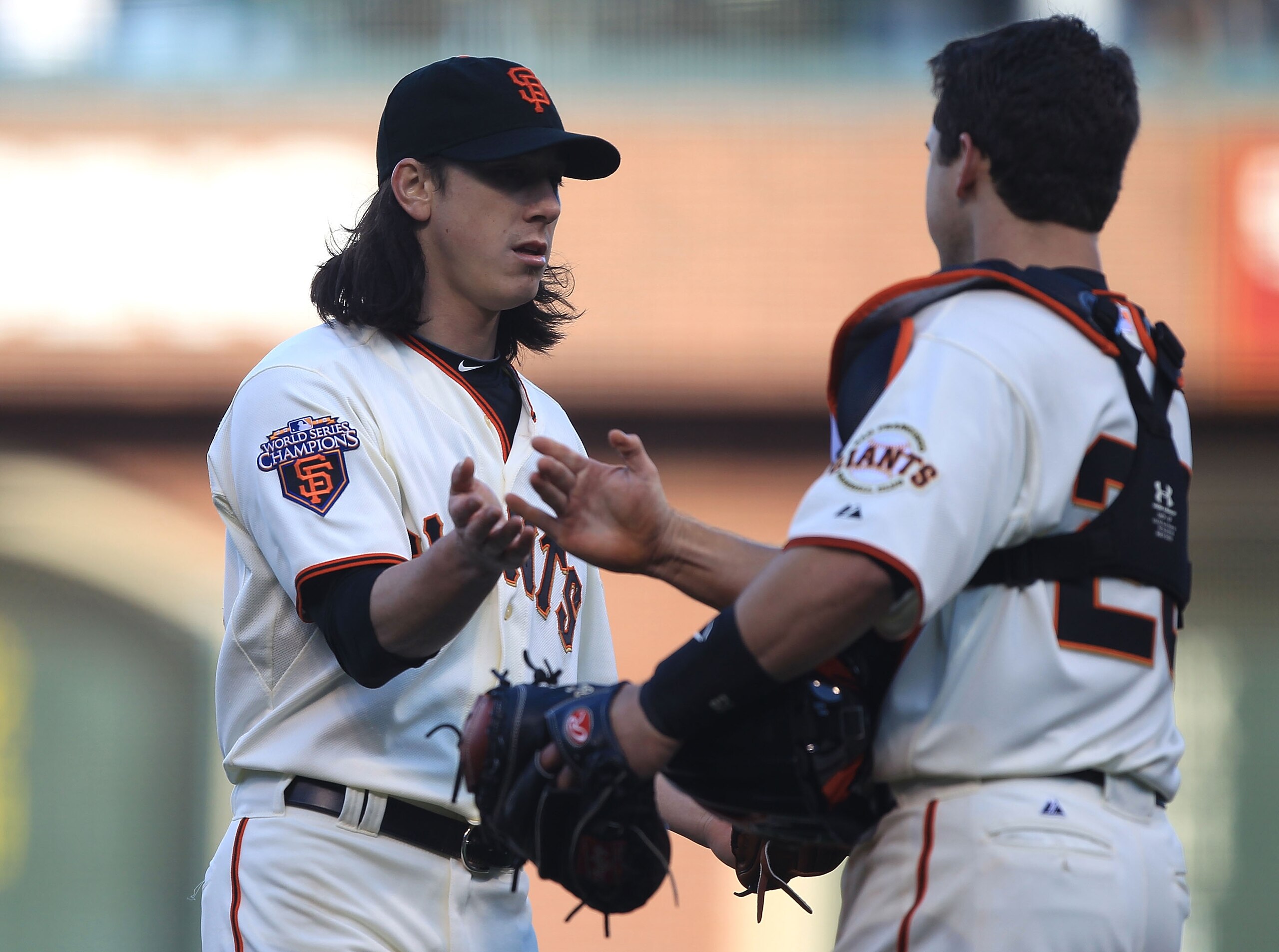 SAN FRANCISCO, CA - MAY 21:  Tim Lincecum #55 of the San Francisco Giants celebrates with Buster Posey #28 after defeating the Oakland Athletics during an MLB game at AT&T Park on May 21, 2011 in San Francisco, California.  (Photo by Jed Jacobsohn/Getty I