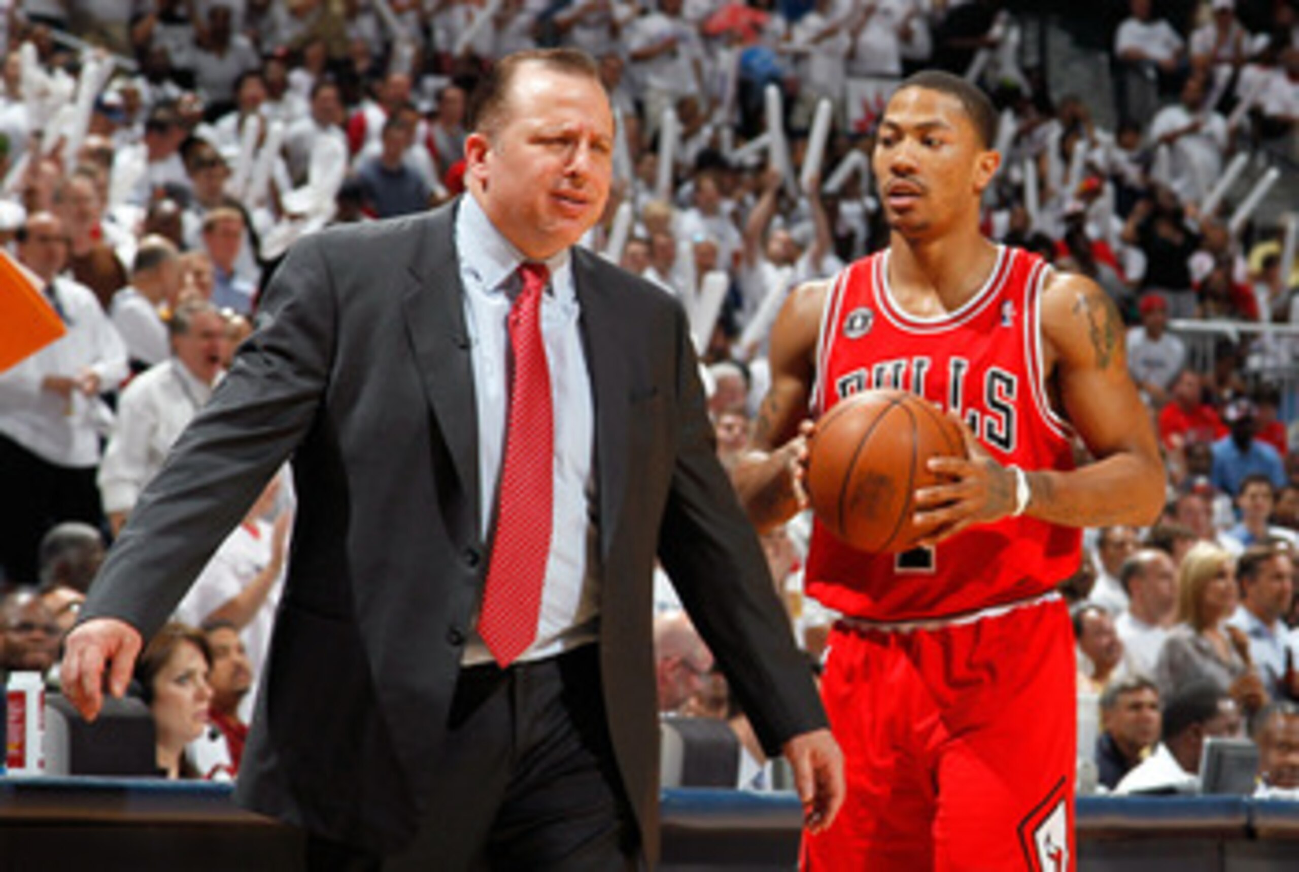 ATLANTA, GA - MAY 12:  Derrick Rose #1 walks off the court as Tom Thibodeau of the Chicago Bulls reacts after calling a timeout against the Atlanta Hawks in Game Six of the Eastern Conference Semifinals in the 2011 NBA Playoffs at Phillips Arena on May 12