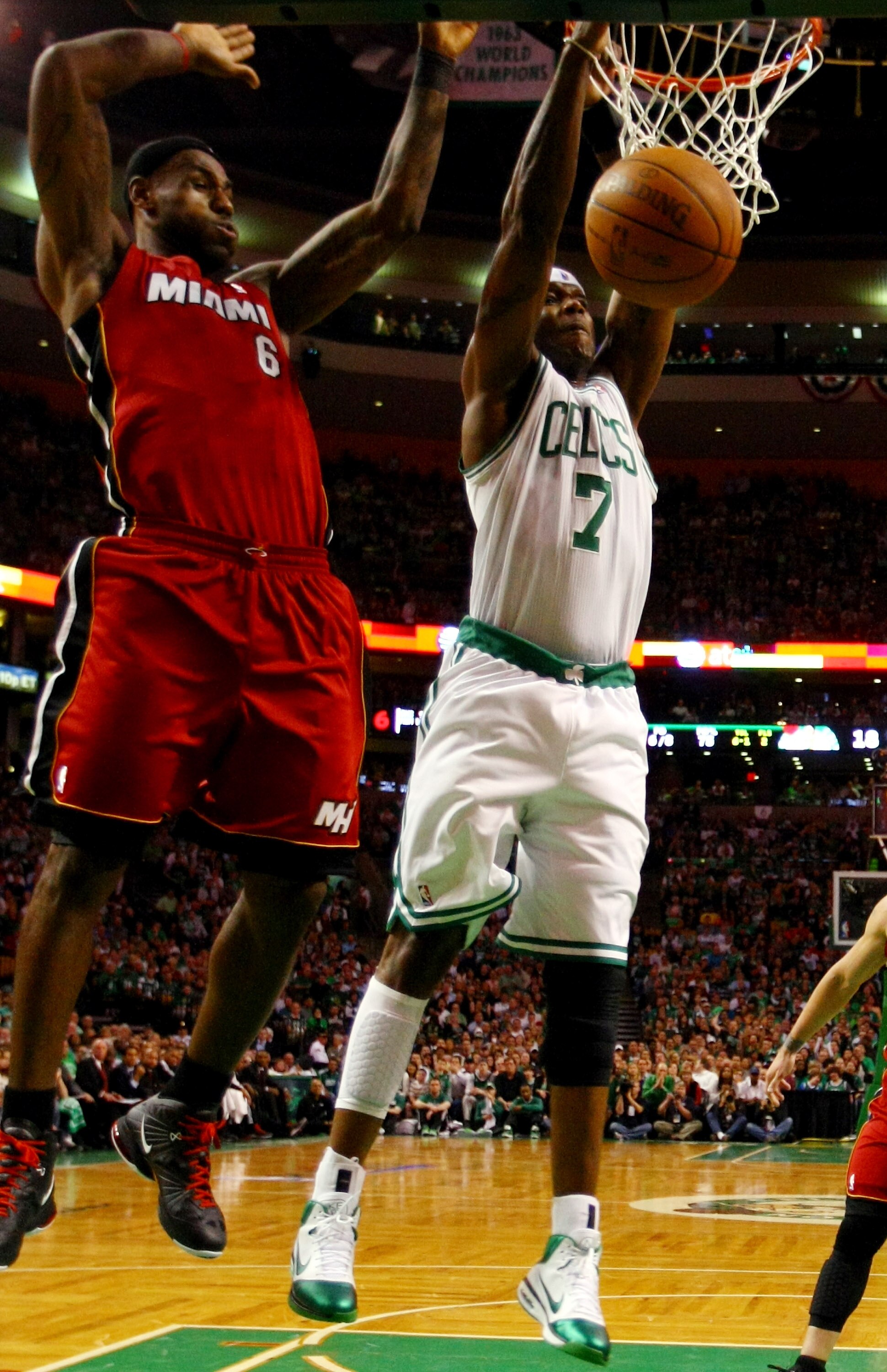 BOSTON, MA - MAY 07: Jermaine O'Neal #7 of the Boston Celtics takes a shot as LeBron James #6 of the Miami Heat defends in Game Three of the Eastern Conference Semifinals in the 2011 NBA Playoffs on May 7, 2011 at the TD Garden in Boston, Massachusetts.  