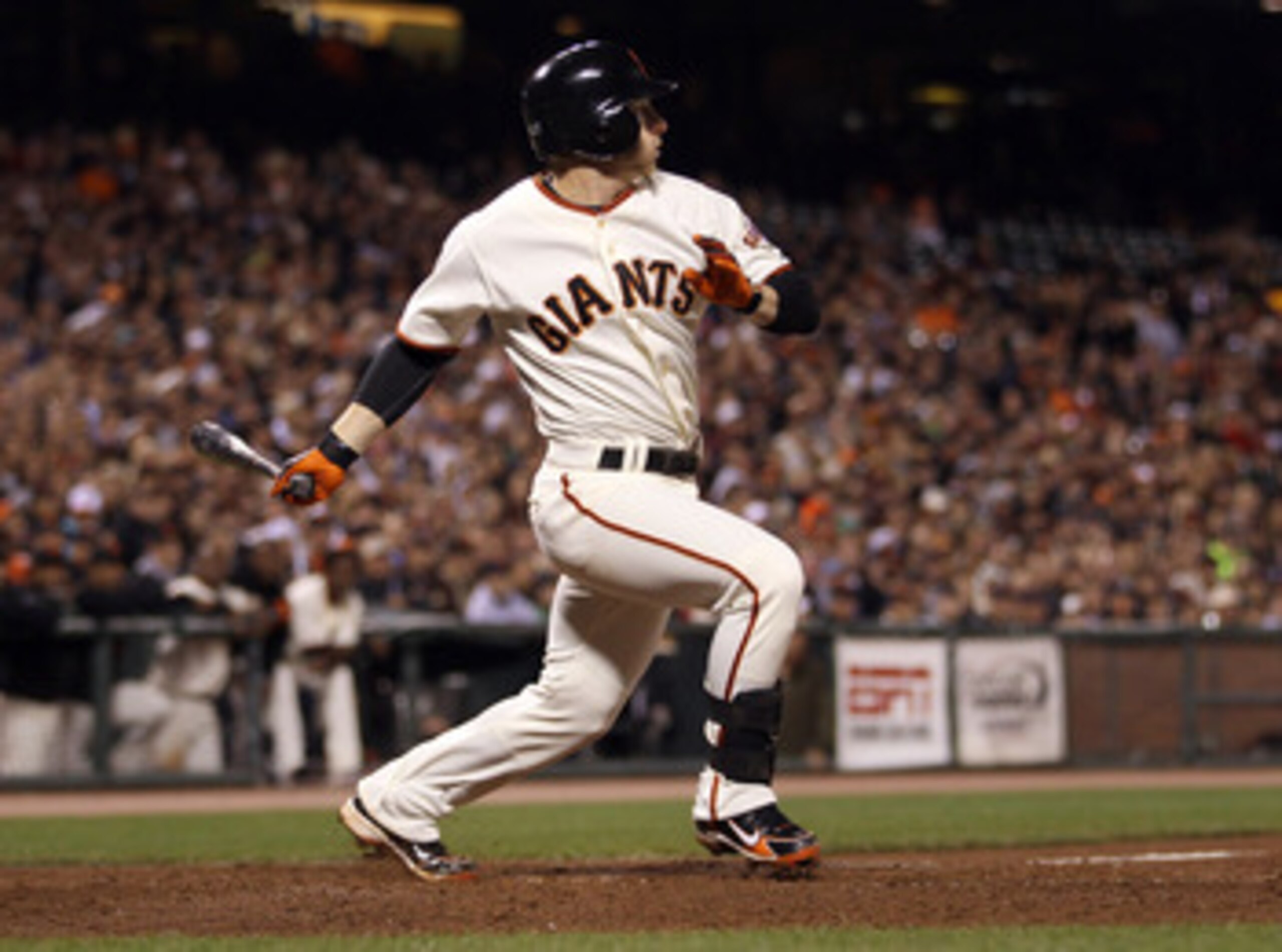 SAN FRANCISCO - SEPTEMBER 15: Mike Fontenot #14 of the San Francisco Giants hits a single that scored pinch runner Emmanuel Burriss to give the Giants a 1-0 lead over the Los Angeles Dodgers in the seventh inning at AT&T Park on September 15, 2010 in San SAN FRANCISCO - SEPTEMBER 15: Mike Fontenot #14 of the San Francisco Giants hits a single that scored pinch runner Emmanuel Burriss to give the Giants a 1-0 lead over the Los Angeles Dodgers in the seventh inning at AT&T Park on September 15, 2010 in San