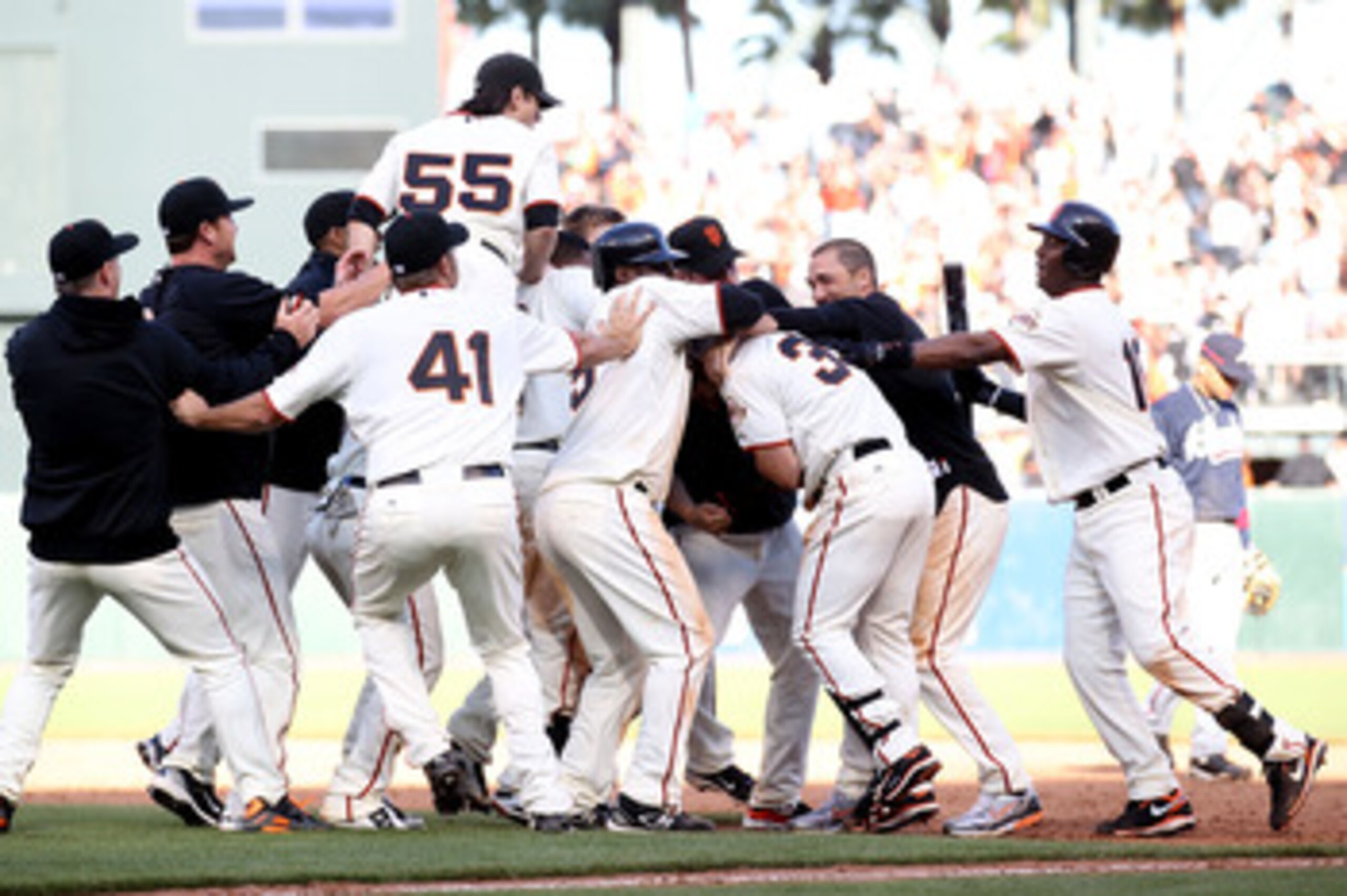 SAN FRANCISCO - APRIL 09: Aaron Rowand #33 of the San Francisco Giants celebrates with teammates after hitting the game winning single in the 13th inning against the Atlanta Braves on Opening Day at AT&T Park on April 9, 2010 in San Francisco, California SAN FRANCISCO - APRIL 09: Aaron Rowand #33 of the San Francisco Giants celebrates with teammates after hitting the game winning single in the 13th inning against the Atlanta Braves on Opening Day at AT&T Park on April 9, 2010 in San Francisco, California