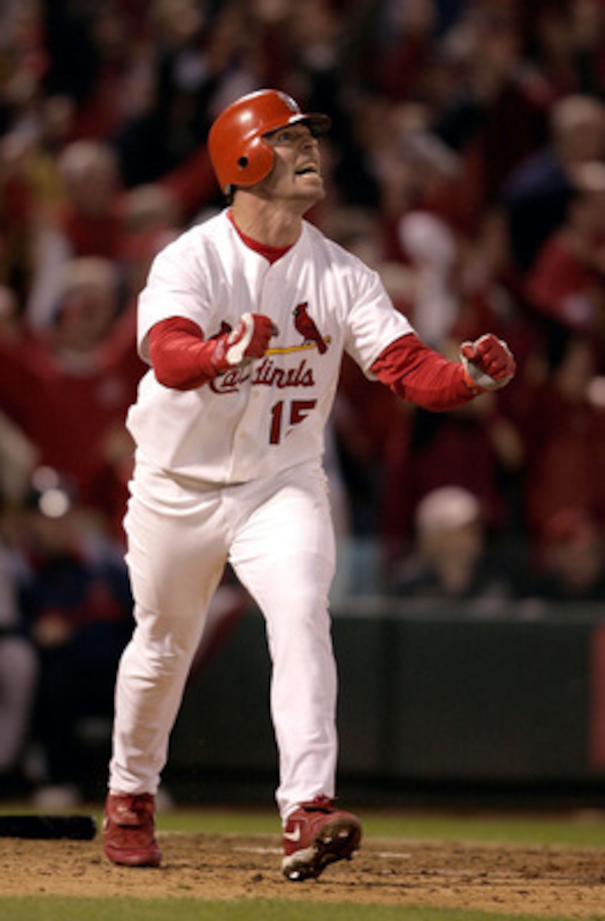 ST LOUIS - OCTOBER 20: Jim Edmonds #15 of the St. Louis Cardinals reacts to hitting a game-winning two-run home run in the bottom of the 12th inning giving the Cardinals a 6-4 victory over the Houston Astros in Game 6 of the National League Championship ST LOUIS - OCTOBER 20: Jim Edmonds #15 of the St. Louis Cardinals reacts to hitting a game-winning two-run home run in the bottom of the 12th inning giving the Cardinals a 6-4 victory over the Houston Astros in Game 6 of the National League Championship