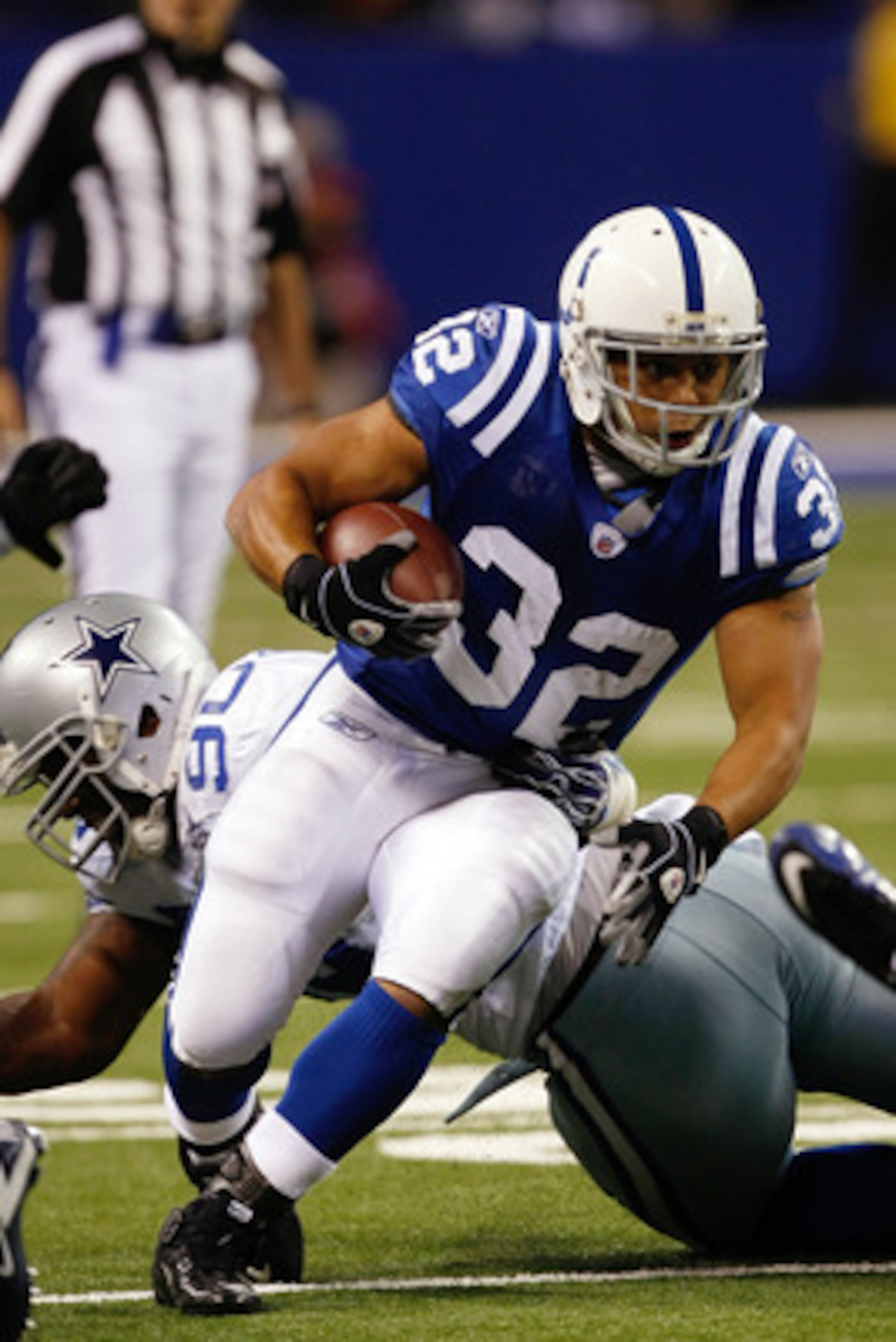 INDIANAPOLIS, IN - DECEMBER 05: Mike Hart #32 of the Indianapolis Colts runs against the Dallas Cowboys at Lucas Oil Stadium on December 5, 2010 in Indianapolis, Indiana.  (Photo by Scott Boehm/Getty Images)