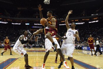 CHARLOTTE, NC - DECEMBER 29:  Ramon Sessions #3 of the Cleveland Cavaliers looks to pass as he kicks Gerald Wallce #3 of the Charlotte Bobcats in the face during their game at Time Warner Cable Arena on December 29, 2010 in Charlotte, North Carolina. NOTE