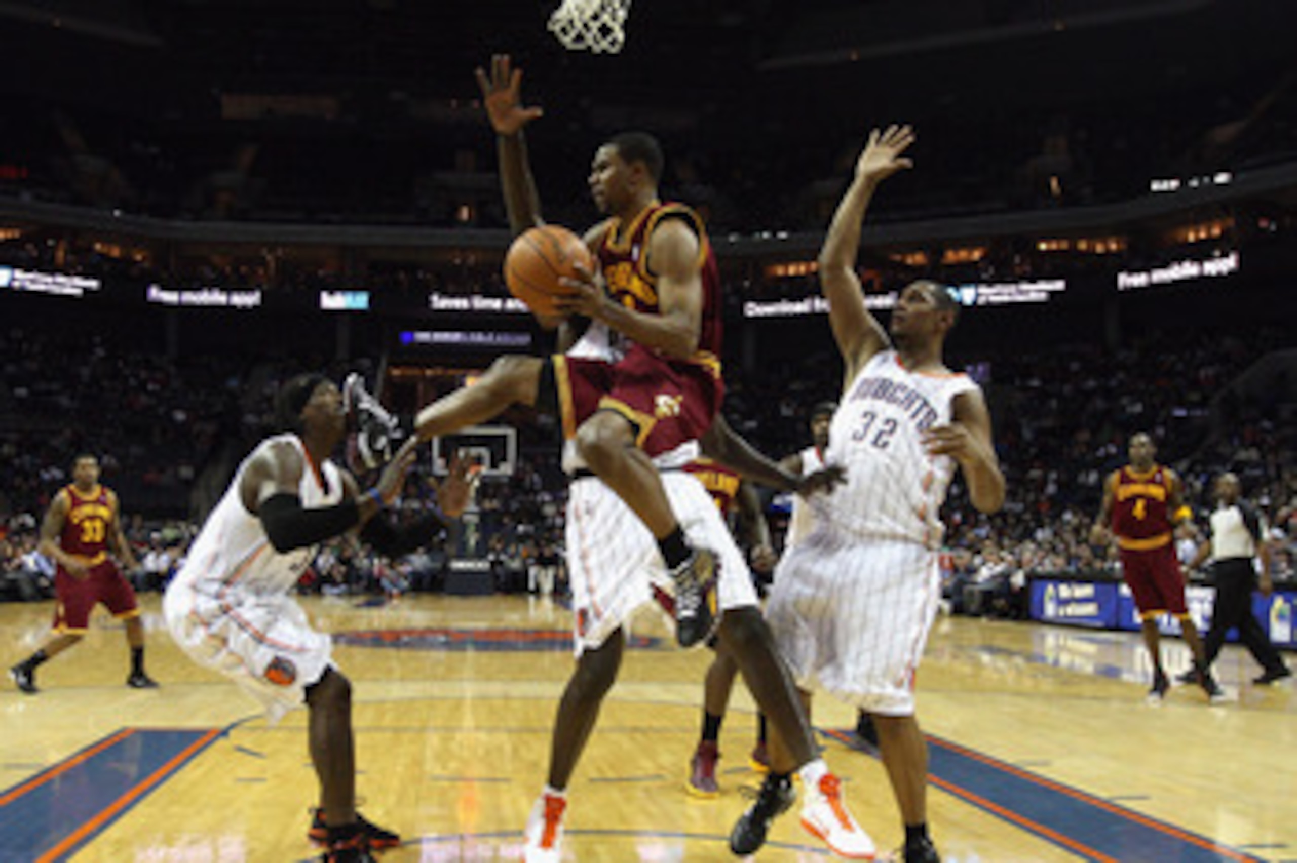 CHARLOTTE, NC - DECEMBER 29:  Ramon Sessions #3 of the Cleveland Cavaliers looks to pass as he kicks Gerald Wallce #3 of the Charlotte Bobcats in the face during their game at Time Warner Cable Arena on December 29, 2010 in Charlotte, North Carolina. NOTE