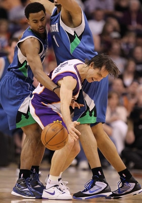 PHOENIX - MARCH 16:  Steve Nash #13 of the Phoenix Suns looses control on the ball while being guarded by Ramon Sessions #7 of the Minnesota Timberwolves during the NBA game at US Airways Center on March 16, 2010 in Phoenix, Arizona. The Suns defeated the
