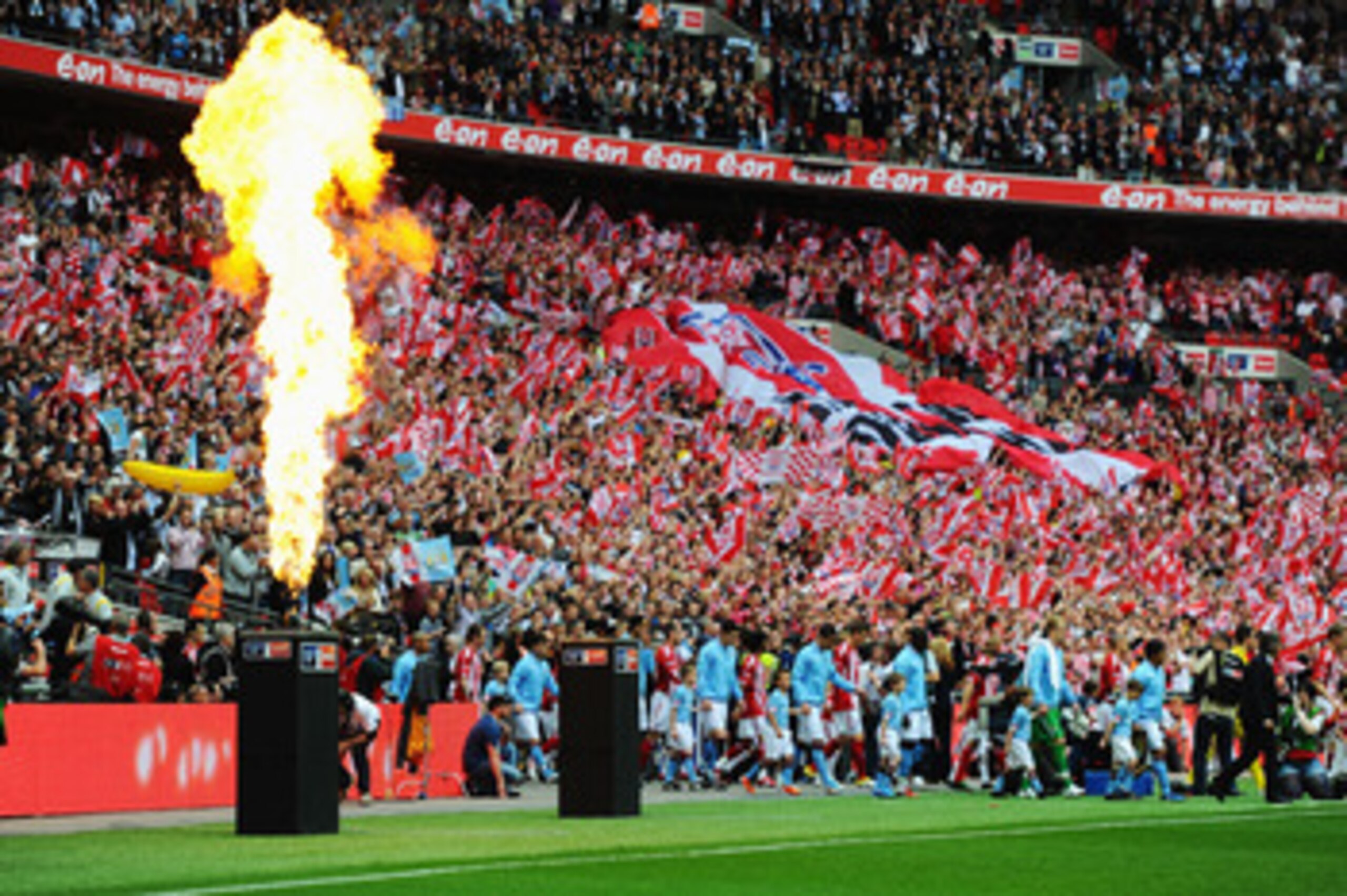 LONDON, ENGLAND - MAY 14:  Team emerge from the tunnel before the start of the FA Cup sponsored by E.ON Final match between Manchester City and Stoke City at Wembley Stadium on May 14, 2011 in London, England.  (Photo by Mike Hewitt/Getty Images)