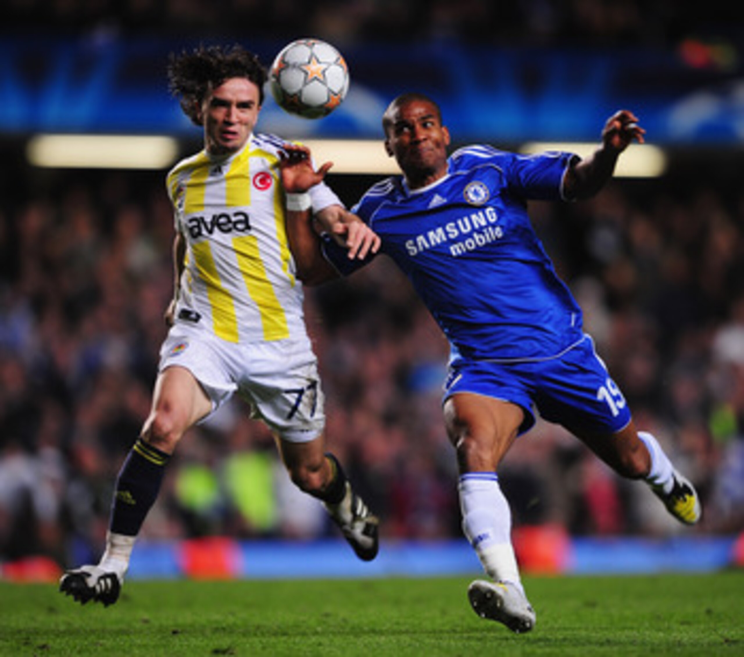 LONDON - APRIL 08:  Florent Malouda of Chelsea challenges Gokhan Gonul of Fenerbahce during the UEFA Champions League Quarter Final 2nd Leg match between Chelsea and Fenerbahce at Stamford Bridge on April 8, 2008 in London, England.  (Photo by Shaun Botte