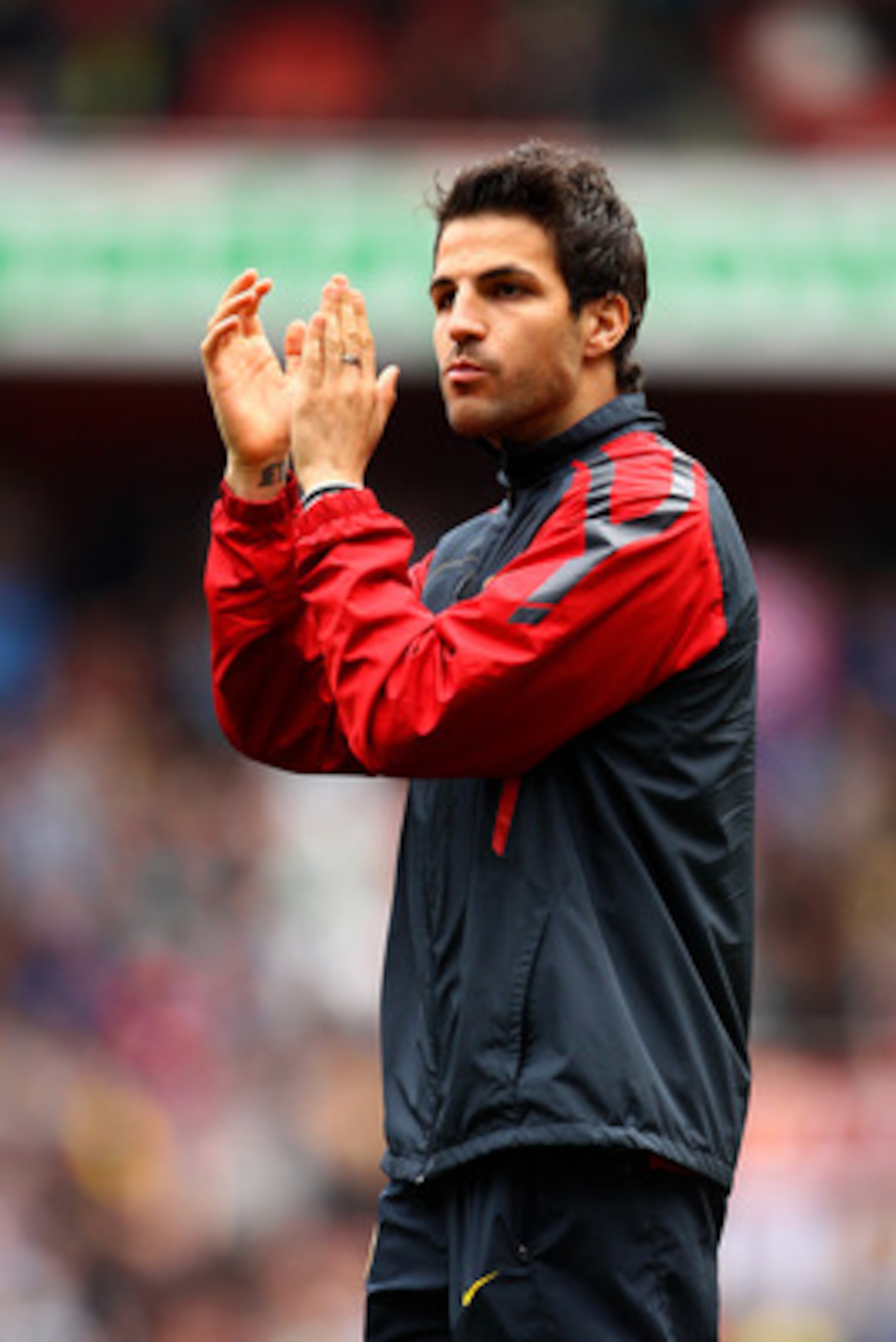 LONDON, ENGLAND - MAY 15:  Cesc Fabregas of Arsenal applauds the fans during a lap of honour after the Barclays Premier League match between Arsenal and Aston Villa at the Emirates Stadium on May 15, 2011 in London, England.  (Photo by Richard Heathcote/G