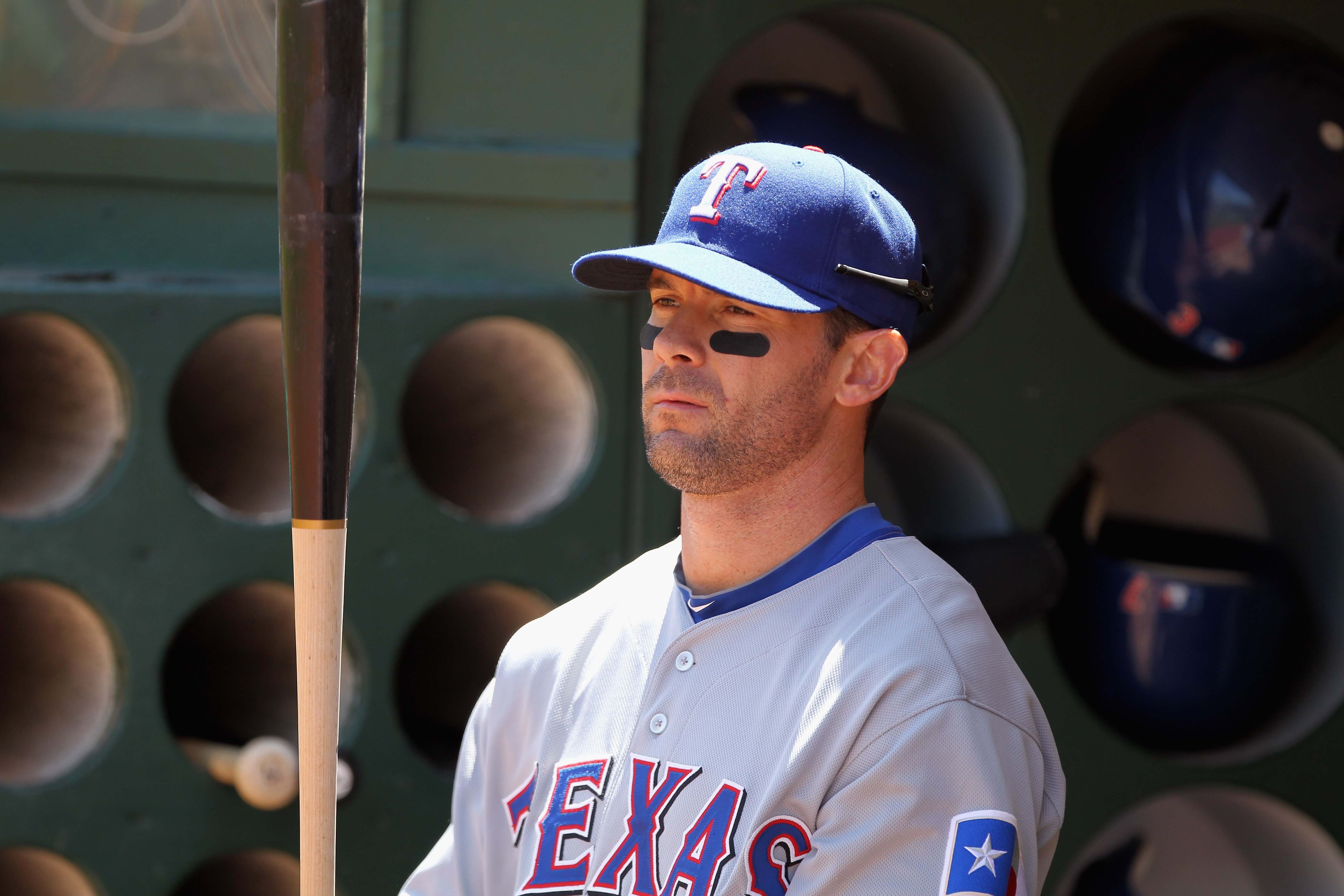OAKLAND, CA - MAY 02:  Michael Young #10 of the Texas Rangers stands in the dugout before their game against the Oakland Athletics at Oakland-Alameda County Coliseum on May 2, 2011 in Oakland, California.  (Photo by Ezra Shaw/Getty Images)