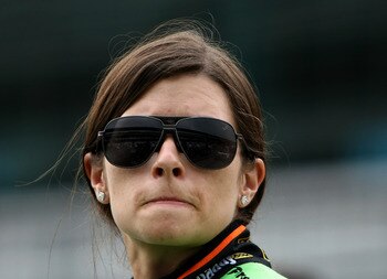 INDIANAPOLIS - MAY 22:  Danica Patrick waits to drive her #7 Team GoDaddy Andretti Autosport Dallara Honda during qualifying for the the 95th Indianapolis 500 Mile Race at the Indianapolis Motor Speedway on May 22, 2011 in Indianapolis, Indiana.  (Photo b