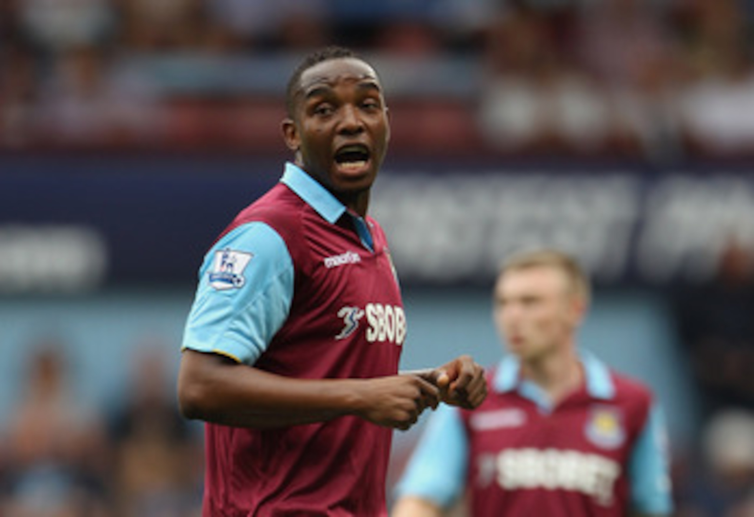 LONDON, ENGLAND - AUGUST 21:  Benni McCarthy  of West Ham Unitedspeaks to team mates during the Barclays Premier League match between West Ham United and Bolton Wanderers at the Boleyn Ground on August 21, 2010 in London, England.  (Photo by Phil Cole/Get
