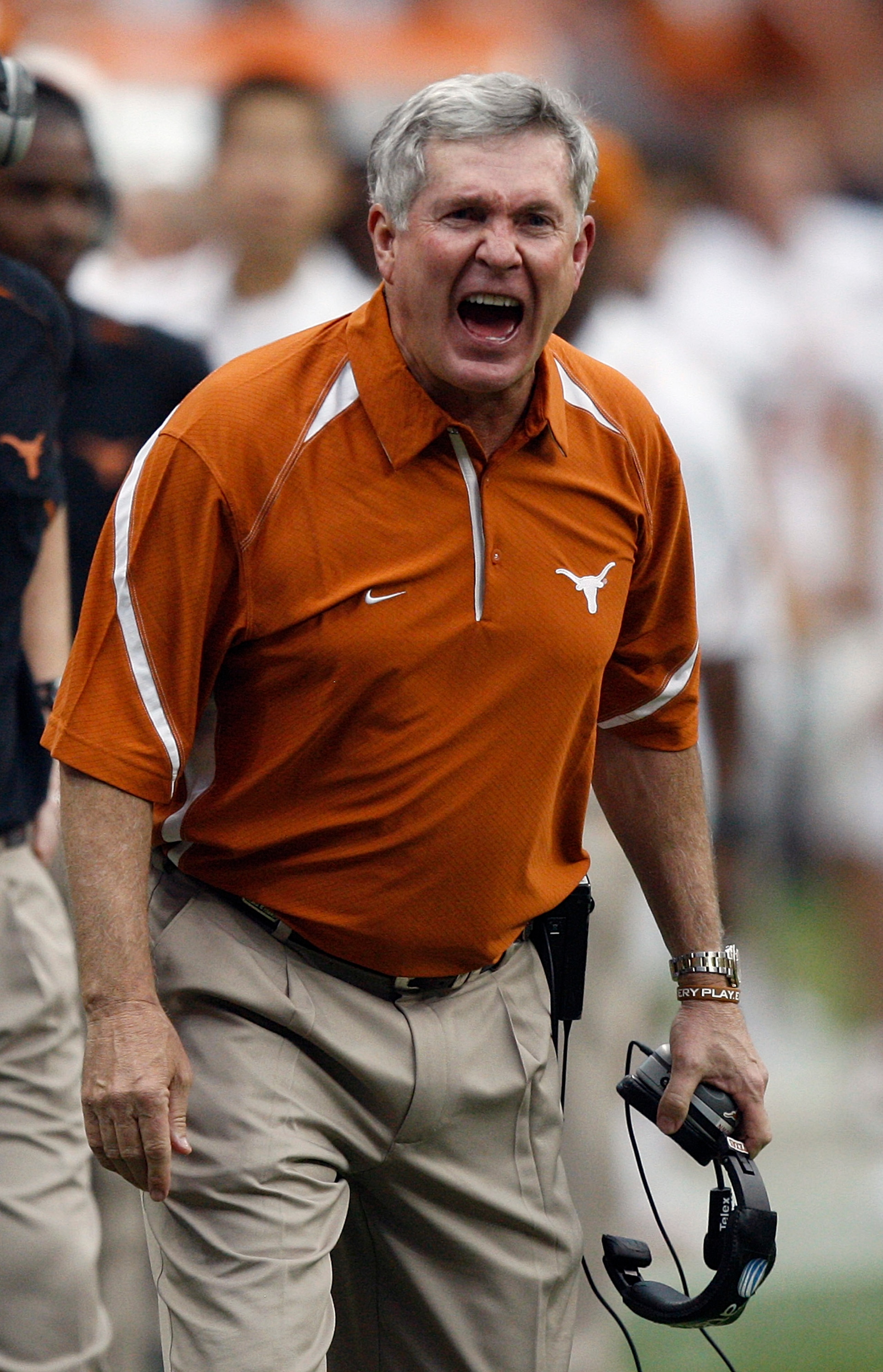 HOUSTON - SEPTEMBER 04:  Mack Brown, head coach of the Texas Longhorns yells at the officials after a delay of game was called in the third quarter during a game against the Rice Owls at Reliant Stadium on September 4, 2010 in Houston, Texas. Texas beat R