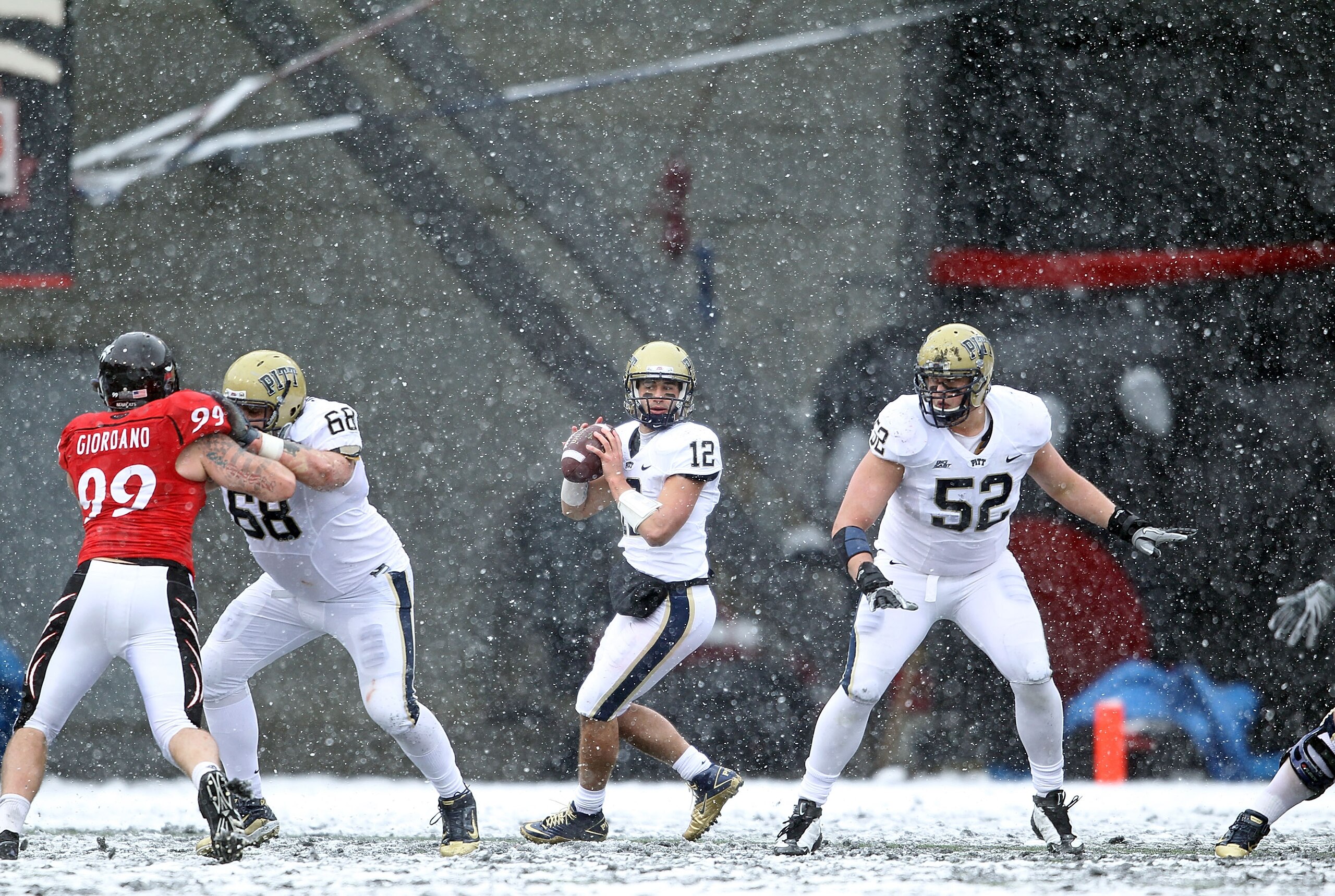 CINCINNATI, OH - DECEMBER 04:  Tino Sunseri #12 of the Pittsburgh Panthers looks to throw the ball during the Big East Conference game against the Cincinnati Bearcats at Nippert Stadium on December 4, 2010 in Cincinnati, Ohio.  Pittsburgh won 28-10.  (Pho