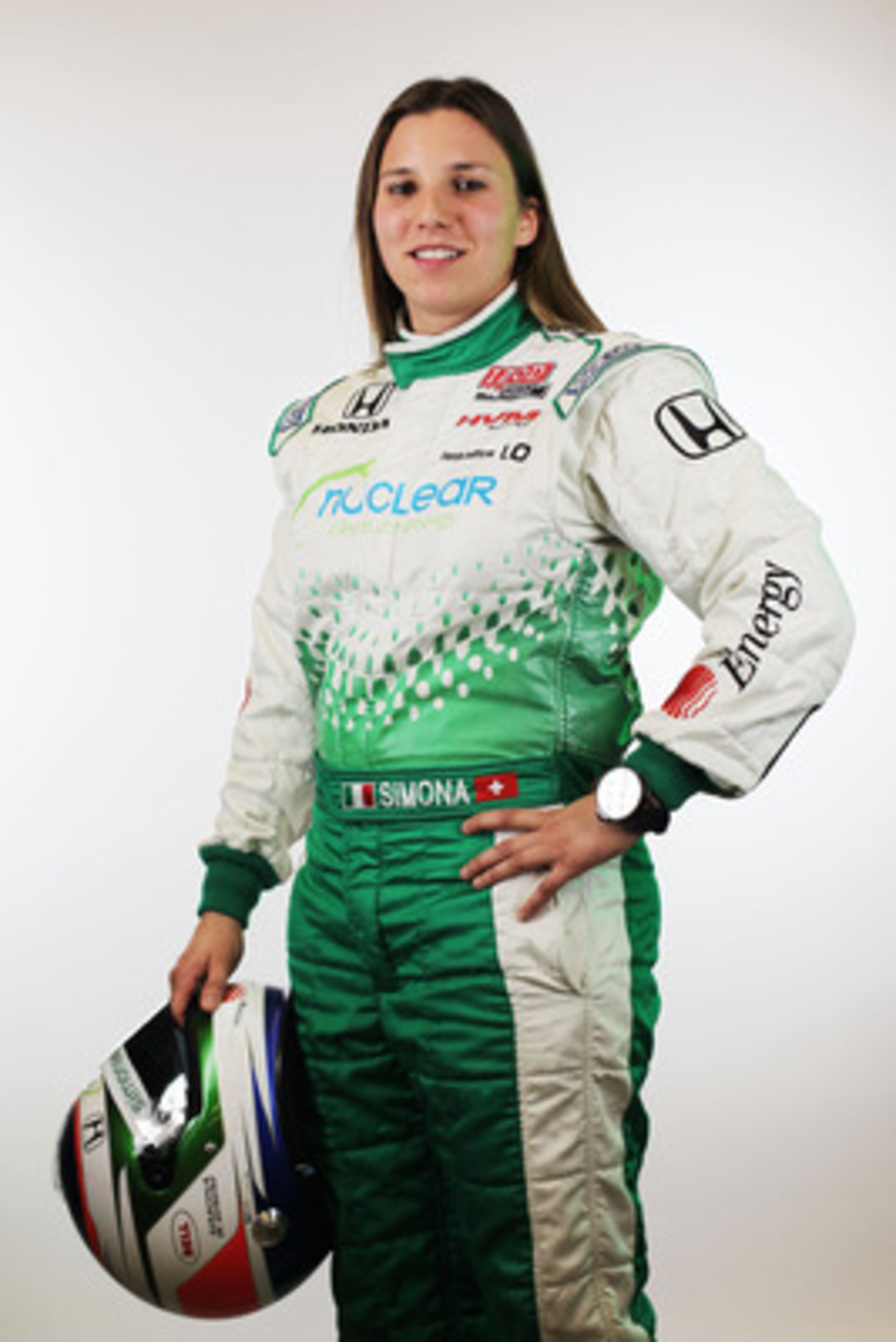 BIRMINGHAM, AL - MARCH 13:  Simona De Silvestro of Switzerland, driver of the #78 Nuclear Clean Air Energy HVM Racing Dallara Honda poses during the IRL Indy Car Series Media Day at Barber Motorsports Park on March 13, 2011 in Birmingham, Alabama.  (Photo