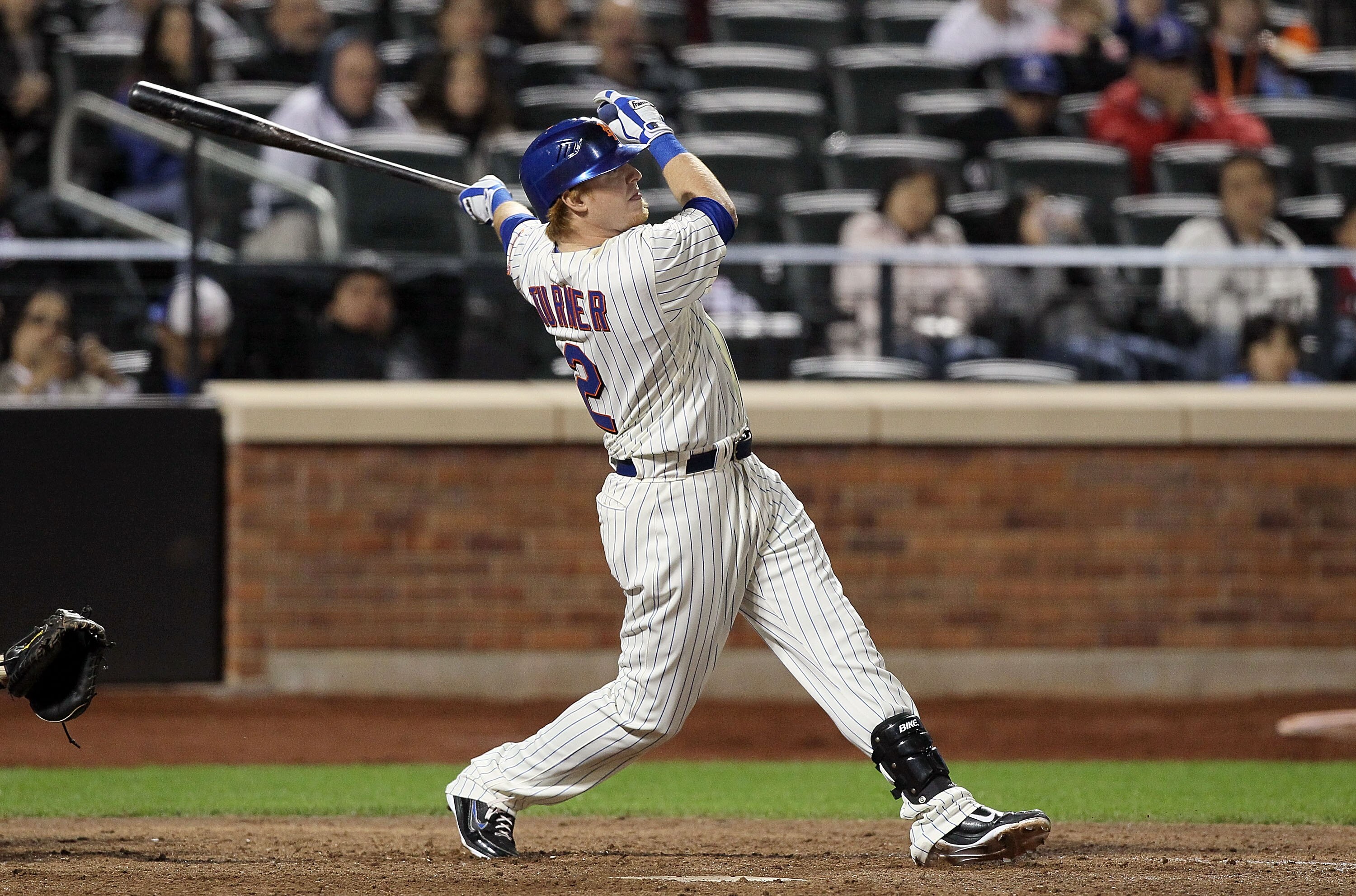 NEW YORK, NY - MAY 07:  Justin Turner #2 of the New York Mets hits an eighth inning two run single against the Los Angeles Dodgers on May 7, 2011 at Citi Field in the Flushing neighborhood of the Queens borough of New York City.  (Photo by Jim McIsaac/Get