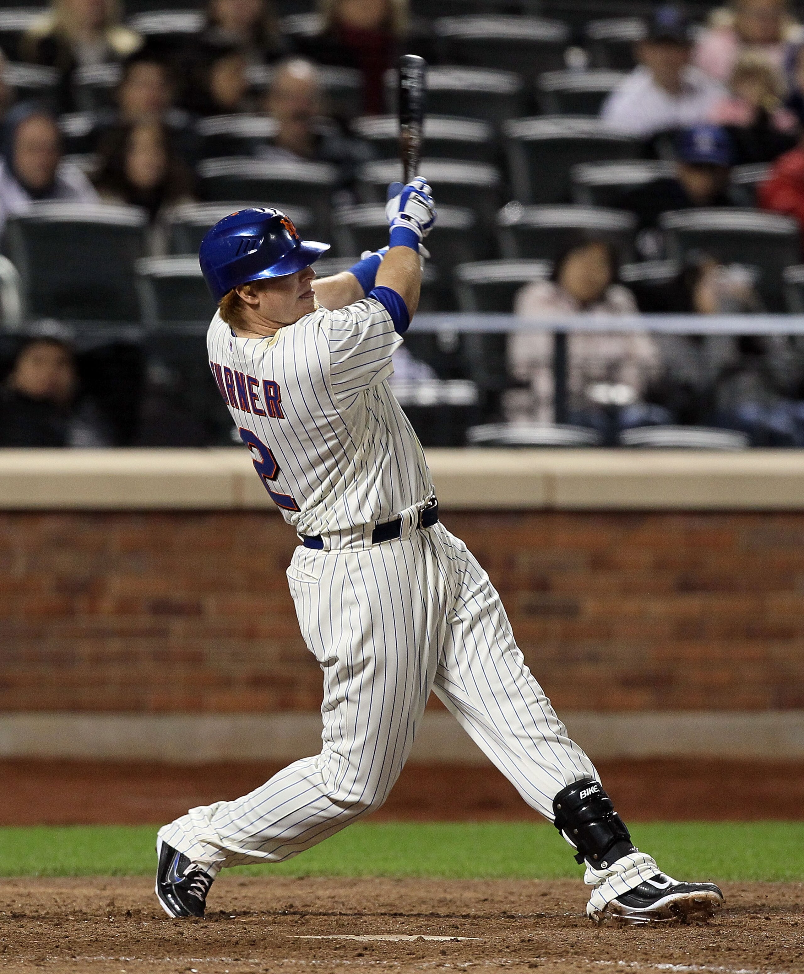 NEW YORK, NY - MAY 07:  Justin Turner #2 of the New York Mets hits an eighth inning two run single against the Los Angeles Dodgers on May 7, 2011 at Citi Field in the Flushing neighborhood of the Queens borough of New York City.  (Photo by Jim McIsaac/Get