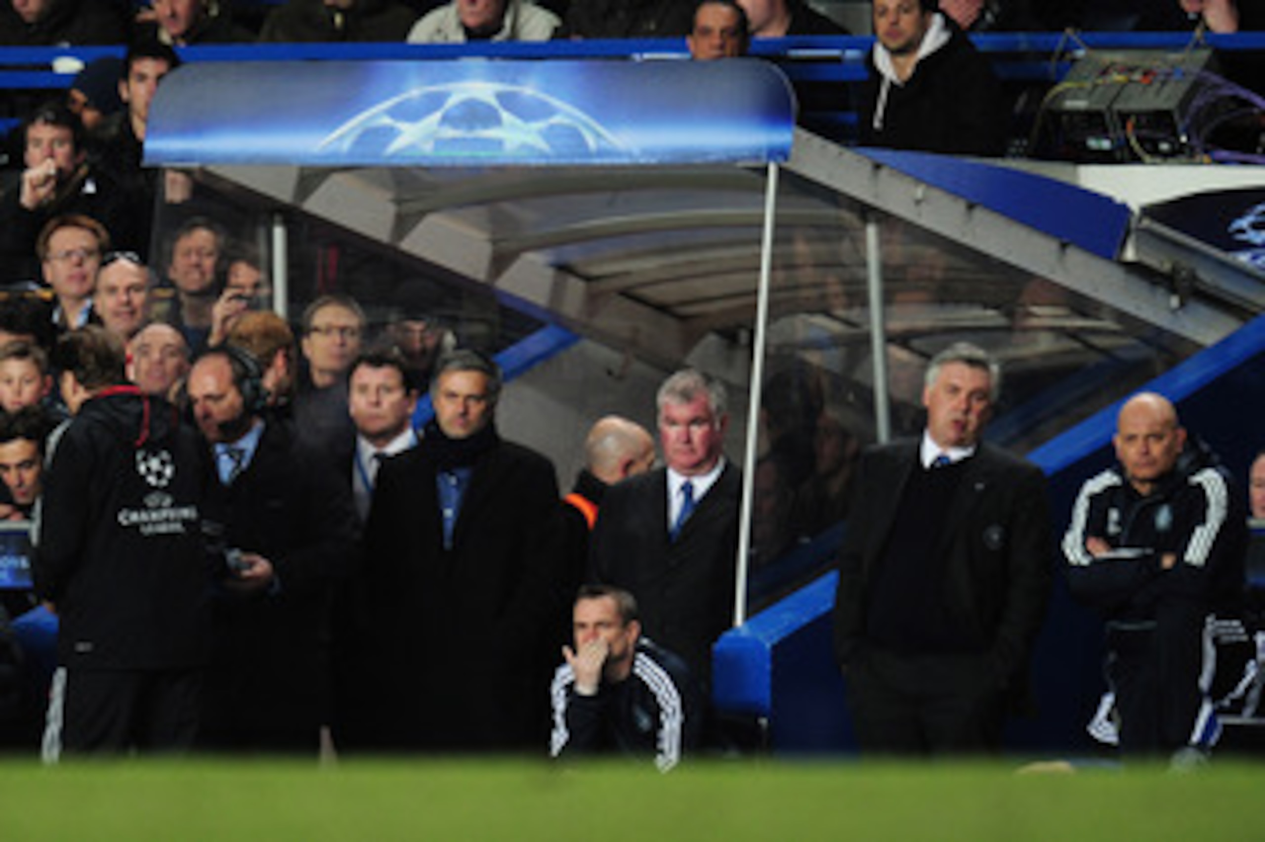 LONDON, ENGLAND - MARCH 16:  Chelsea manager Carlo Ancelotti looks on as Inter Milan manager Jose Mourinho leaves after the UEFA Champions League round of 16 second leg match between Chelsea and Inter Milan at Stamford Bridge on March 16, 2010 in London,