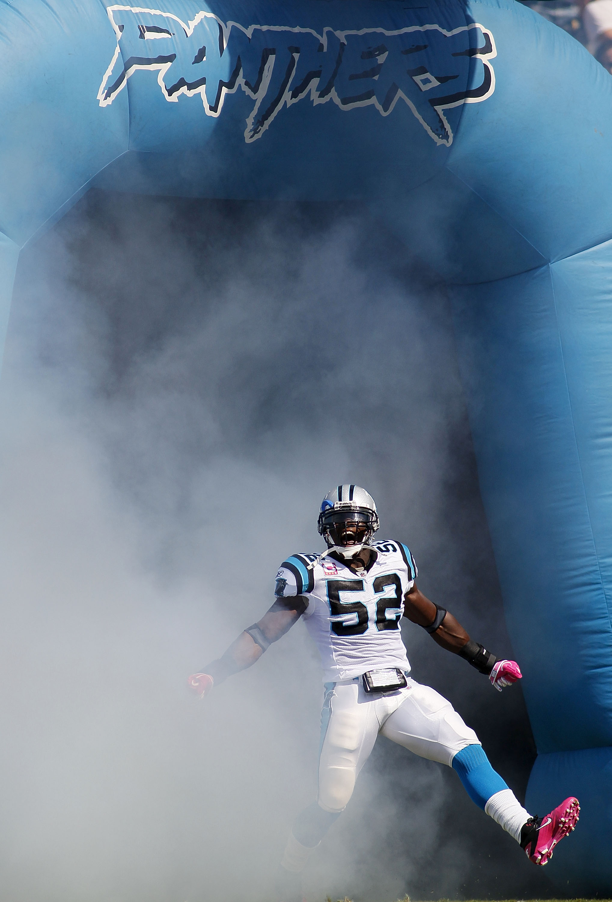 CHARLOTTE, NC - OCTOBER 10: Linebacker Jon Beason #52 of the Carolina Panthers is introduced prior to the Panthers game against the Chicago Bears at Bank of America Stadium on October 10, 2010 in Charlotte, North Carolina.  (Photo by Geoff Burke/Getty Ima