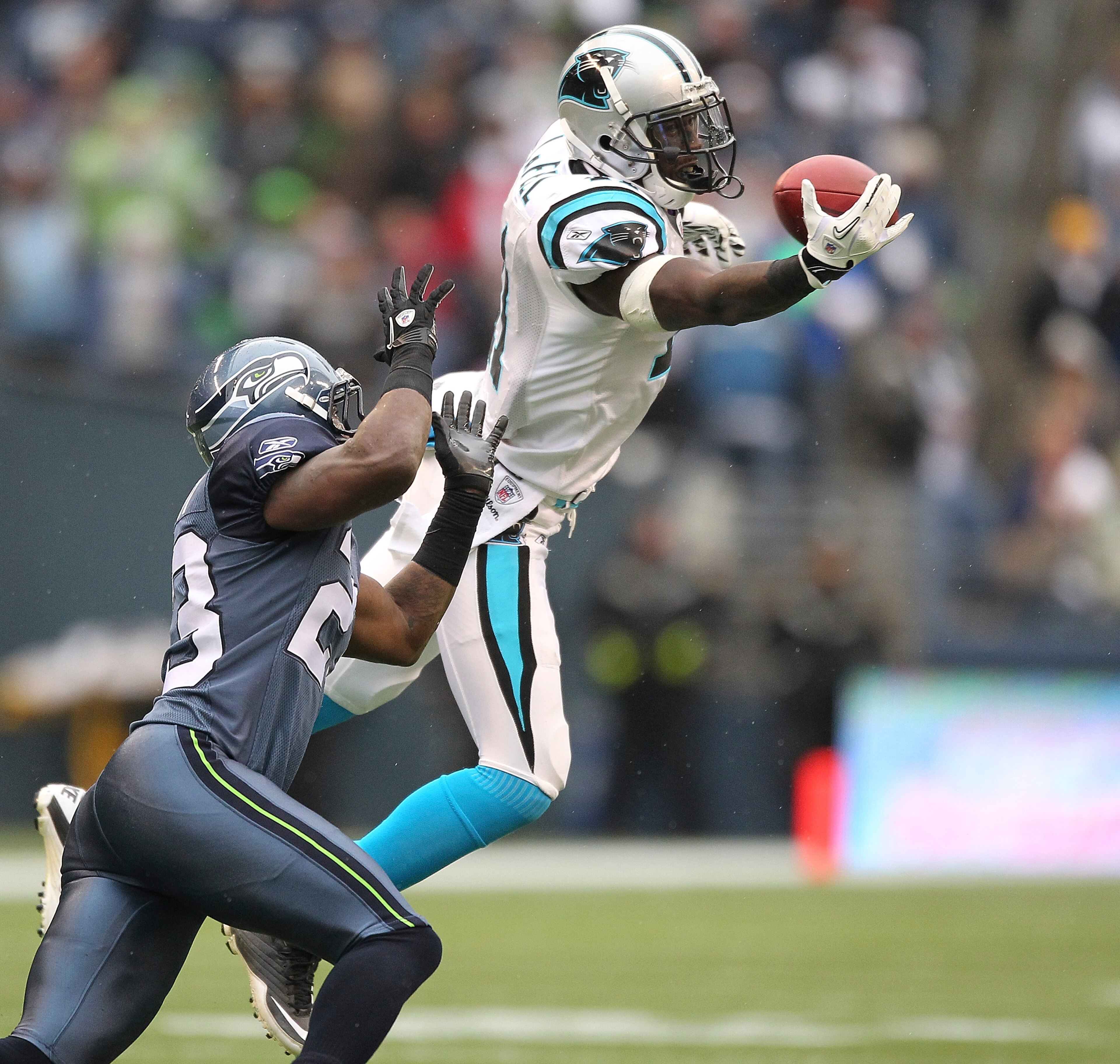 SEATTLE, WA - DECEMBER 05: Wide receiver Brandon LaFell #11 of the Carolina Panthers just misses this pass against Marcus Trufant #23 of the Seattle Seahawks at Qwest Field on December 5, 2010 in Seattle, Washington. (Photo by Otto Greule Jr/Getty Images SEATTLE, WA - DECEMBER 05: Wide receiver Brandon LaFell #11 of the Carolina Panthers just misses this pass against Marcus Trufant #23 of the Seattle Seahawks at Qwest Field on December 5, 2010 in Seattle, Washington. (Photo by Otto Greule Jr/Getty Images