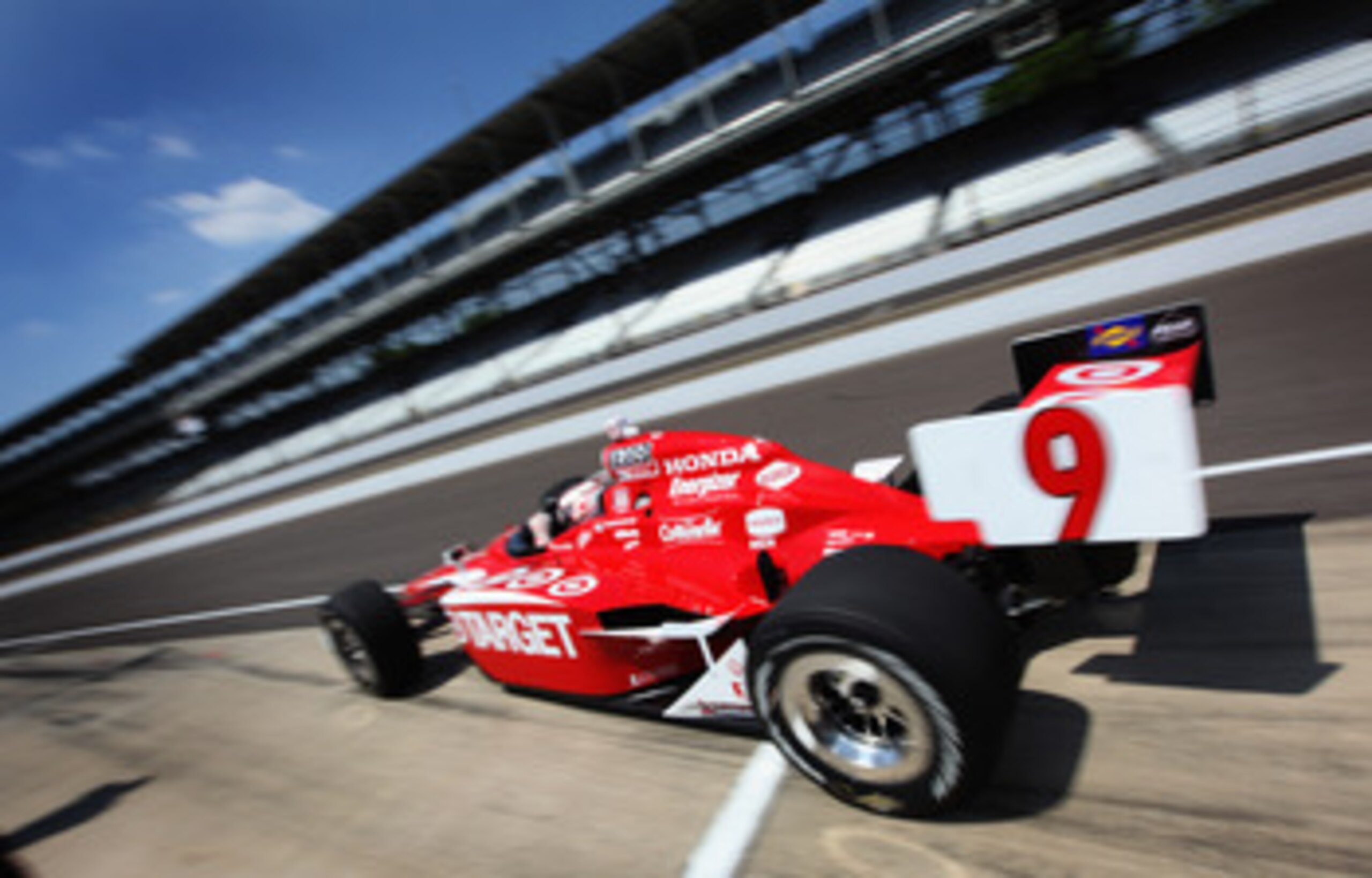 INDIANAPOLIS, IN - MAY 20:  Scott Dixon of New Zealand drives the #9 Target Chip Ganassi Racing Dallara Honda off of pit lane during practice for the Indianapolis 500 on May 20, 2011 at Indianapolis Motor Speedway in Indianapolis, Indiana.  (Photo by Jami
