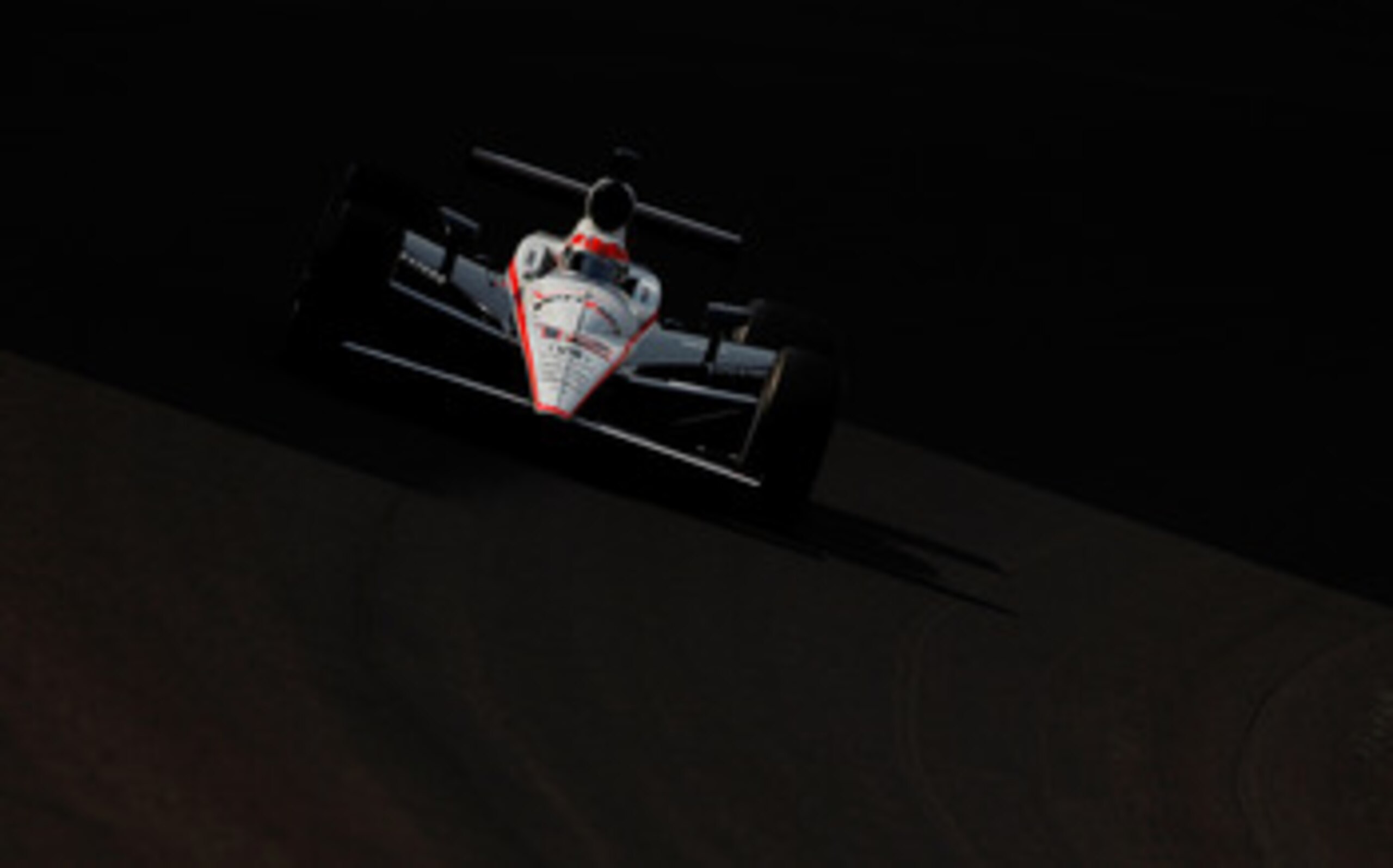 INDIANAPOLIS - MAY 20:  Will Power drives his #12 Verizon Team Penske Dallara Honda during practice for the the 95th Indianapolis 500 Mile Race at the Indianapolis Motor Speedway on May 20, 2011 in Indianapolis, Indiana.  (Photo by Jonathan Ferrey/Getty I