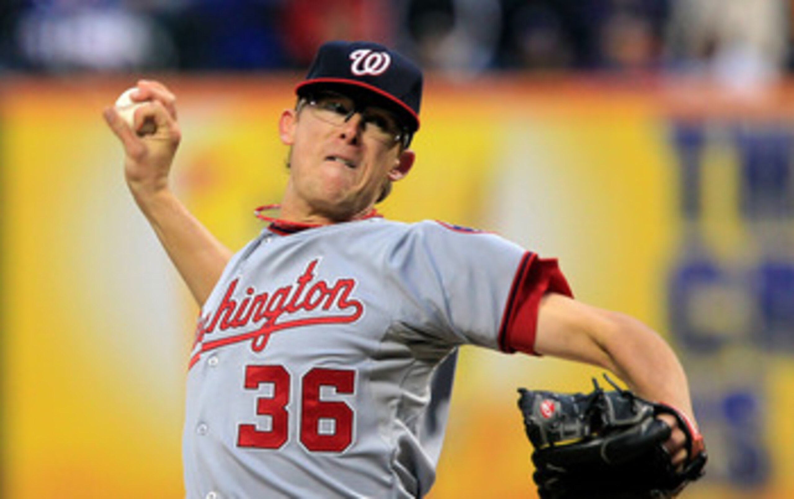 NEW YORK, NY - APRIL 08:  Tyler Clippard #36 of the Washington Nationals throws a pitch against the New York Mets during the Mets' Home Opener at Citi Field on April 8, 2011 in the Flushing neighborhood of Queens in New York City. The Nationals won 6-2.