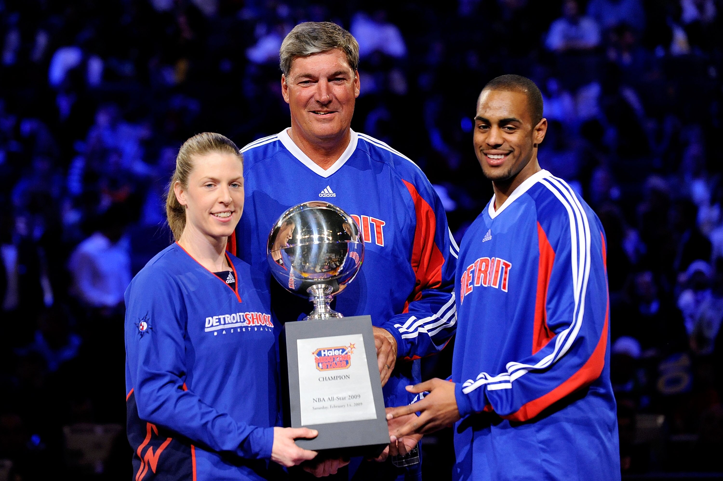 PHOENIX - FEBRUARY 14:  (L-R) Katie Smith, Bill Laimbeer and Arron Afflalo of Detroit pose with the trophy after winning the Haier Shooting Stars on All-Star Saturday Night, part of 2009 NBA All-Star Weekend at US Airways Center on February 14, 2009 in Ph