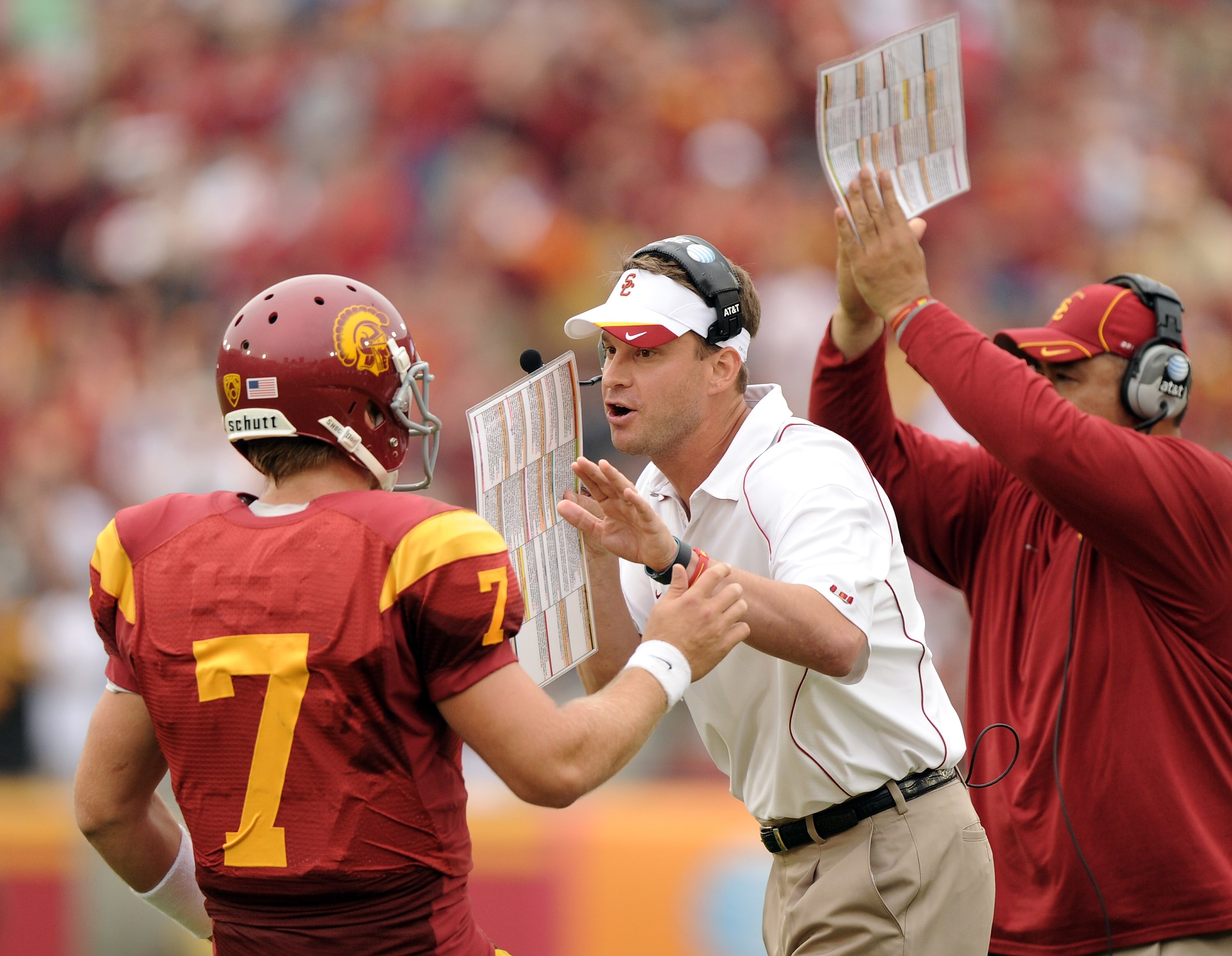 LOS ANGELES, CA - OCTOBER 16: Head Coach Lane Kiffin and Matt Barkley #7 of the USC Trojans react to a 3rd and 1 conversion against the California Golden Bears during the second quarter at Los Angeles Memorial Coliseum on October 16, 2010 in Los Angeles,