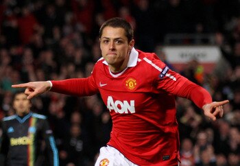 MANCHESTER, ENGLAND - MARCH 15:  Javier Hernandez of Manchester United celebrates scoring the opening goal during the UEFA Champions League round of 16 second leg match between Manchester United and Marseille at Old Trafford on March 15, 2011 in Mancheste
