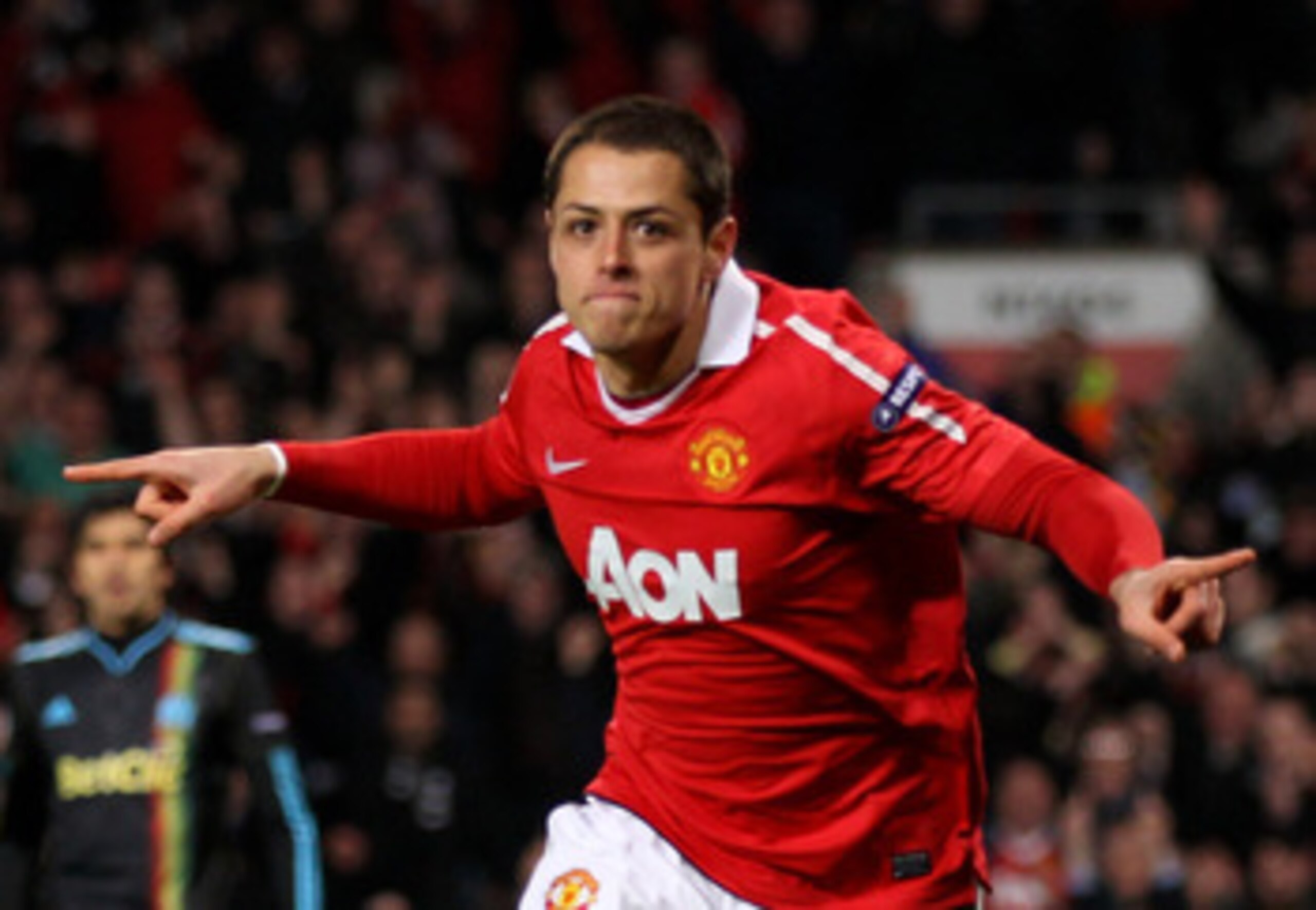 MANCHESTER, ENGLAND - MARCH 15:  Javier Hernandez of Manchester United celebrates scoring the opening goal during the UEFA Champions League round of 16 second leg match between Manchester United and Marseille at Old Trafford on March 15, 2011 in Mancheste