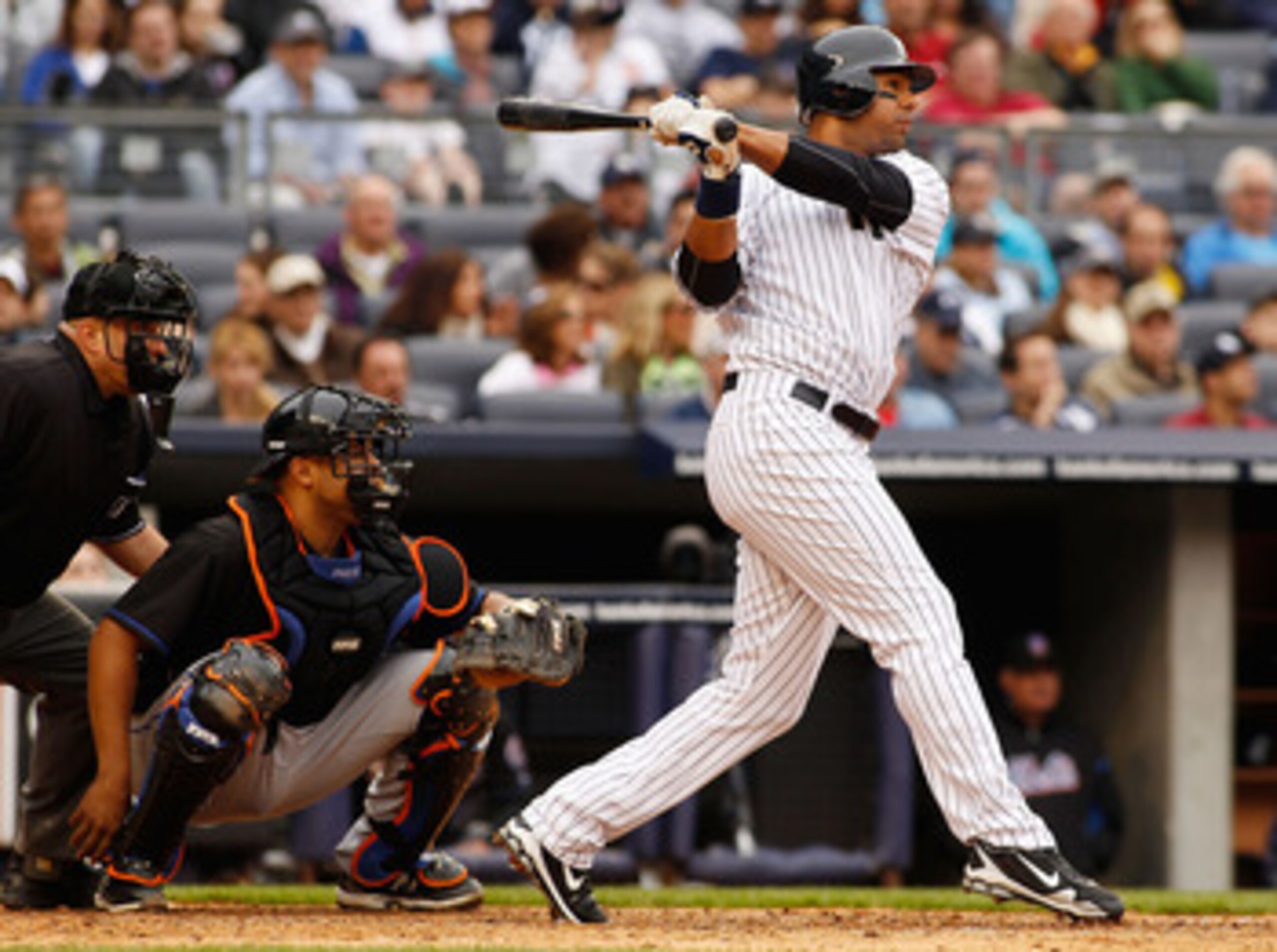 NEW YORK - MAY 22:  Chris Dickerson #27 of the New York Yankees hits a double in the seventh inning against the New York Mets on May 22, 2011 at Yankee Stadium in the Bronx borough of New York City. Yankees defeat the Mets 9-3. (Photo by Mike Stobe/Getty