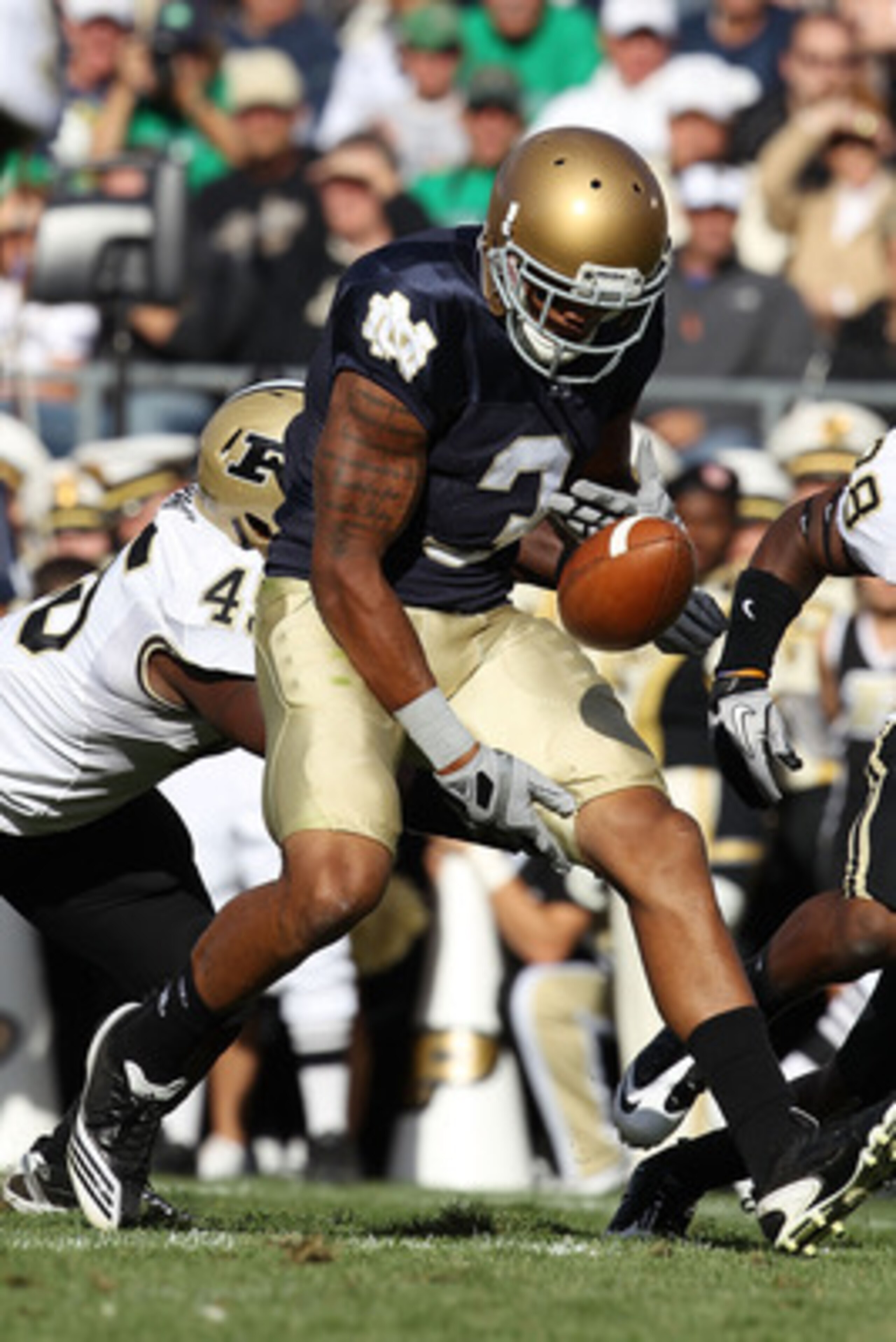 SOUTH BEND, IN - SEPTEMBER 04: Michael Flyod #3 of the Notre Dame Fighting Irish fumbles the ball near the end zone against the Purdue Boilermakers at Notre Dame Stadium on September 4, 2010 in South Bend, Indiana. (Photo by Jonathan Daniel/Getty Images)